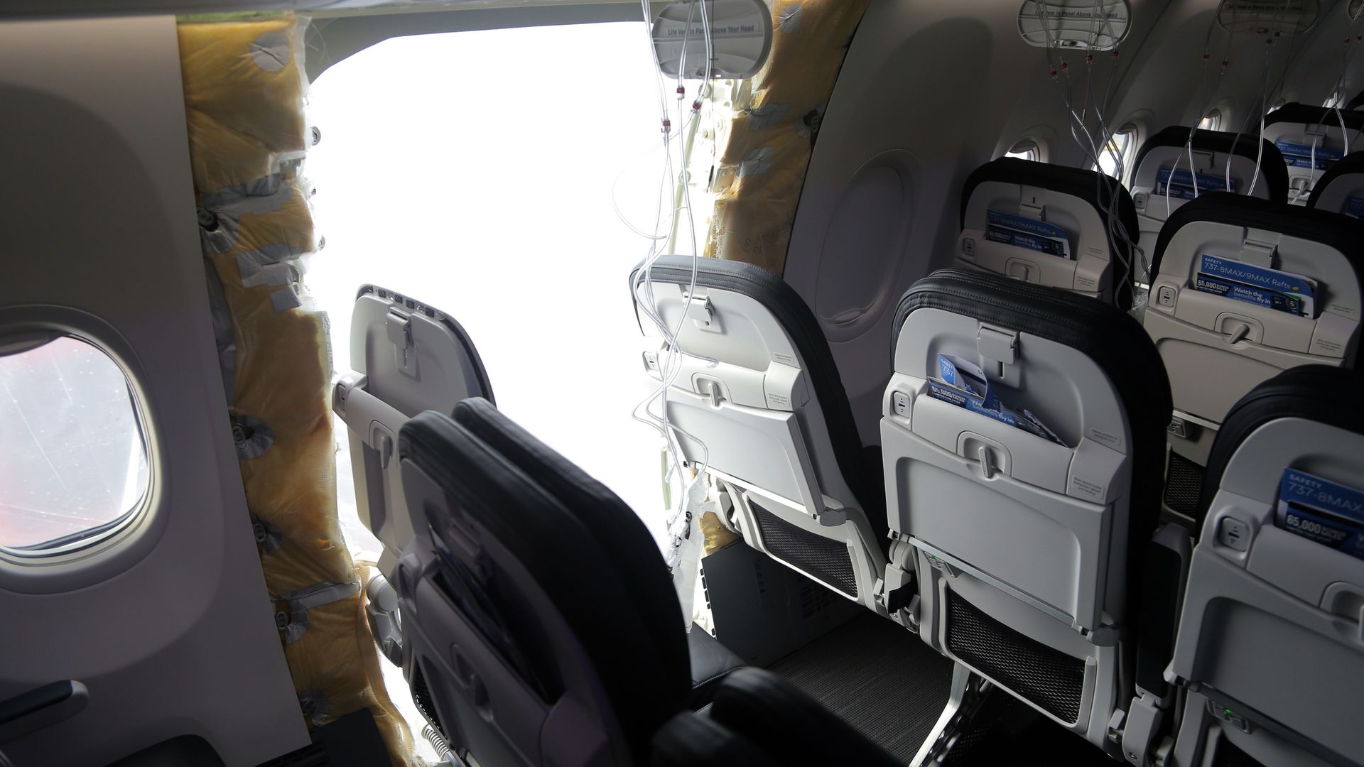 An opening in the fuselage of a Boeing 737-9 MAX operated by Alaska Airlines in Portland in January 2023.