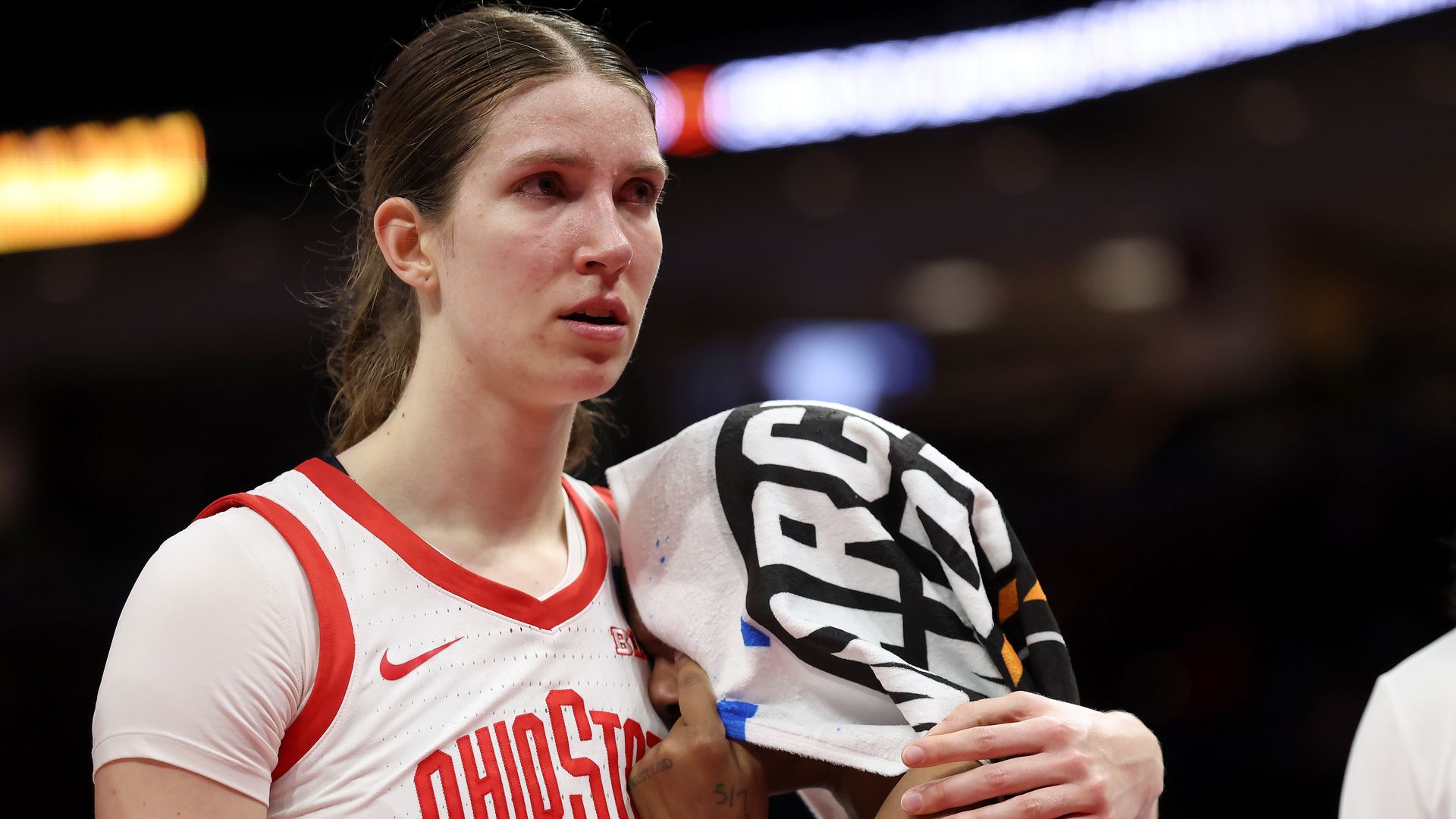 Elsa Lemmila #12 of the Ohio State Buckeyes and Kennedy Cambridge #3 stand at the end of the court after being defeated by the Notre Dame Fighting Irish during the NCAA Women's Basketball Tournament Second Round game