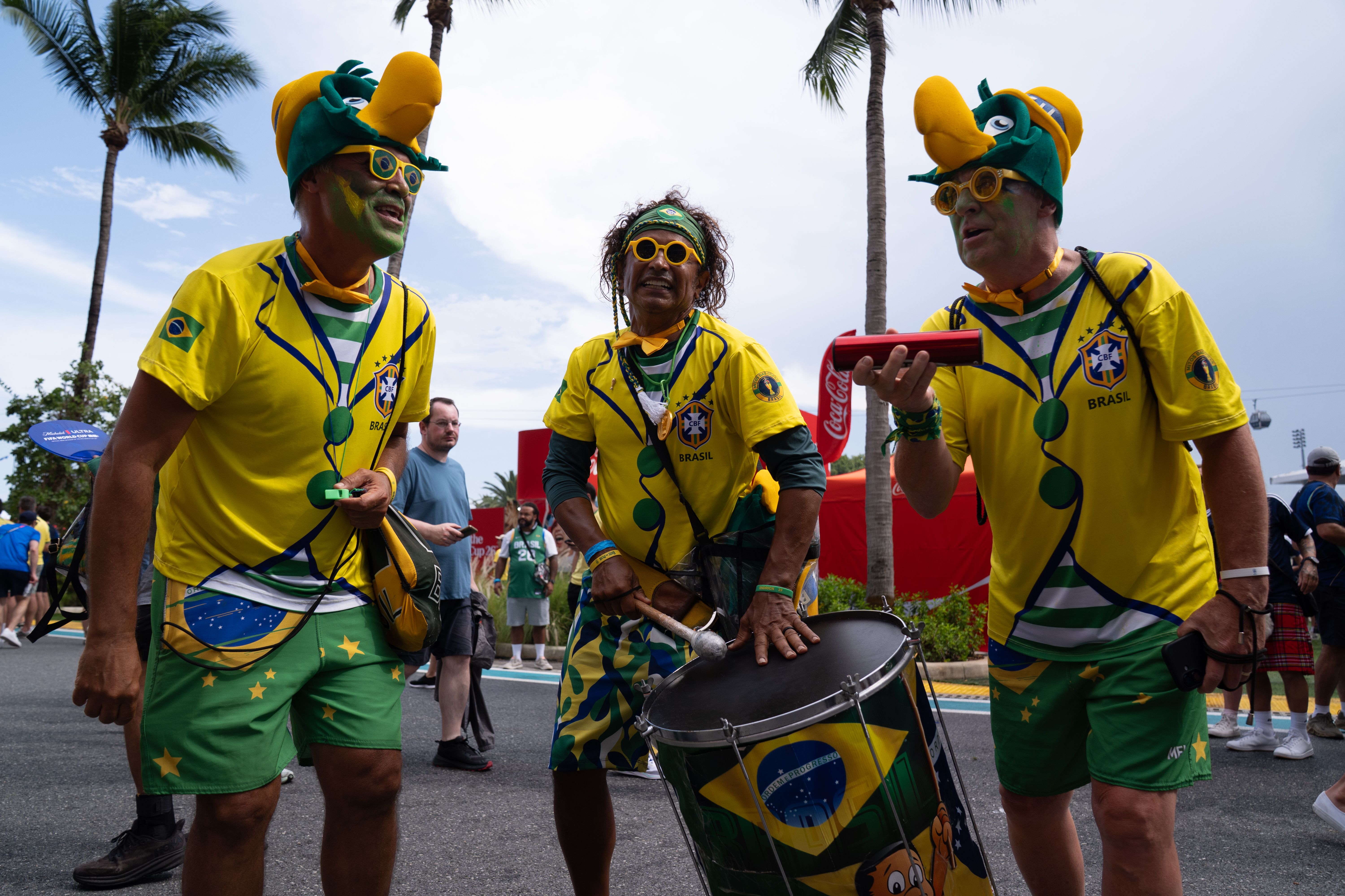 MIAMI, UNITED STATES - JUNE 24: Brazil and Scotland supporters arrive at Hard Rock Stadium ahead of their FIFA World Cup 2026 Group C match in Miami, Florida, United States on June 24, 2026. Fans from both nations created a festive atmosphere outside the venue, dancing samba, singing together, and c