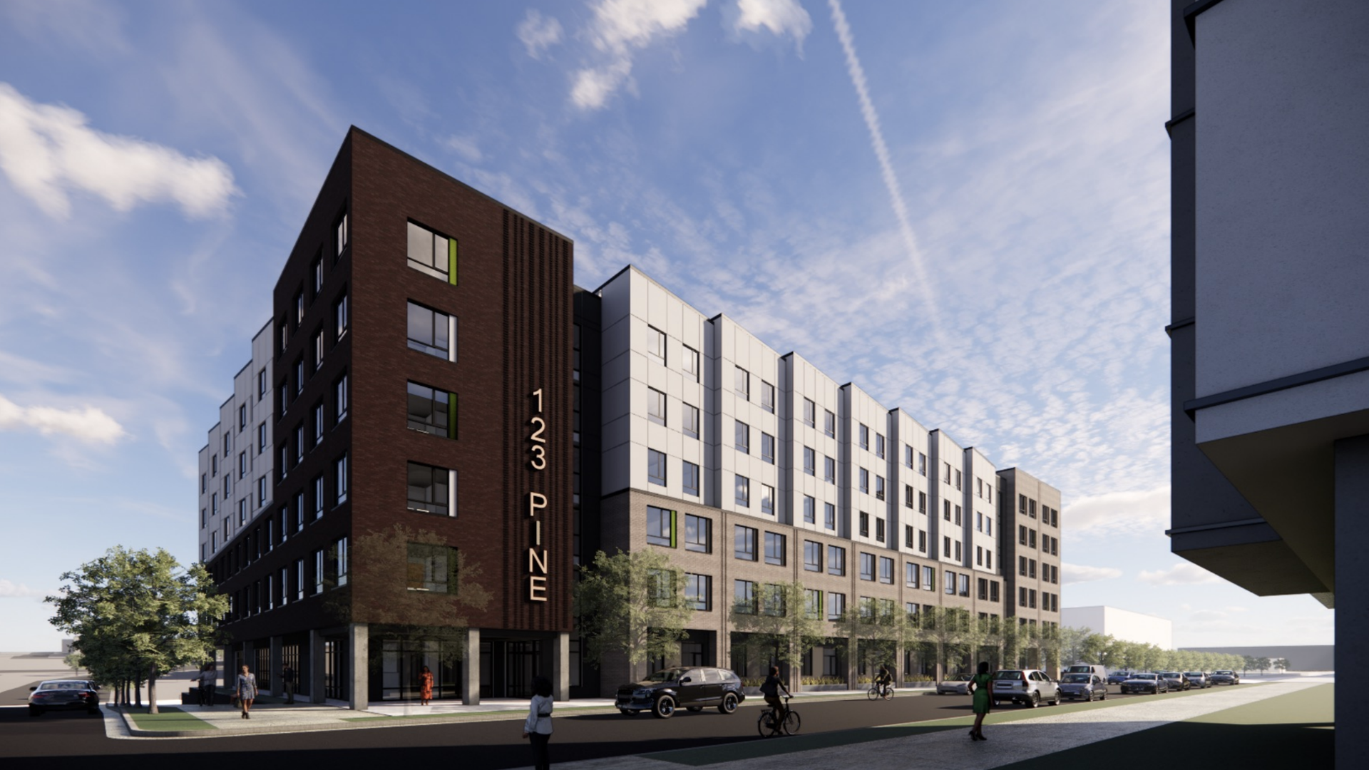 Modern multi-story building with dark brown and white facade, large windows, and vertical sign "123 PINE" on corner; street view with cars, cyclists, pedestrians, trees, and blue sky.