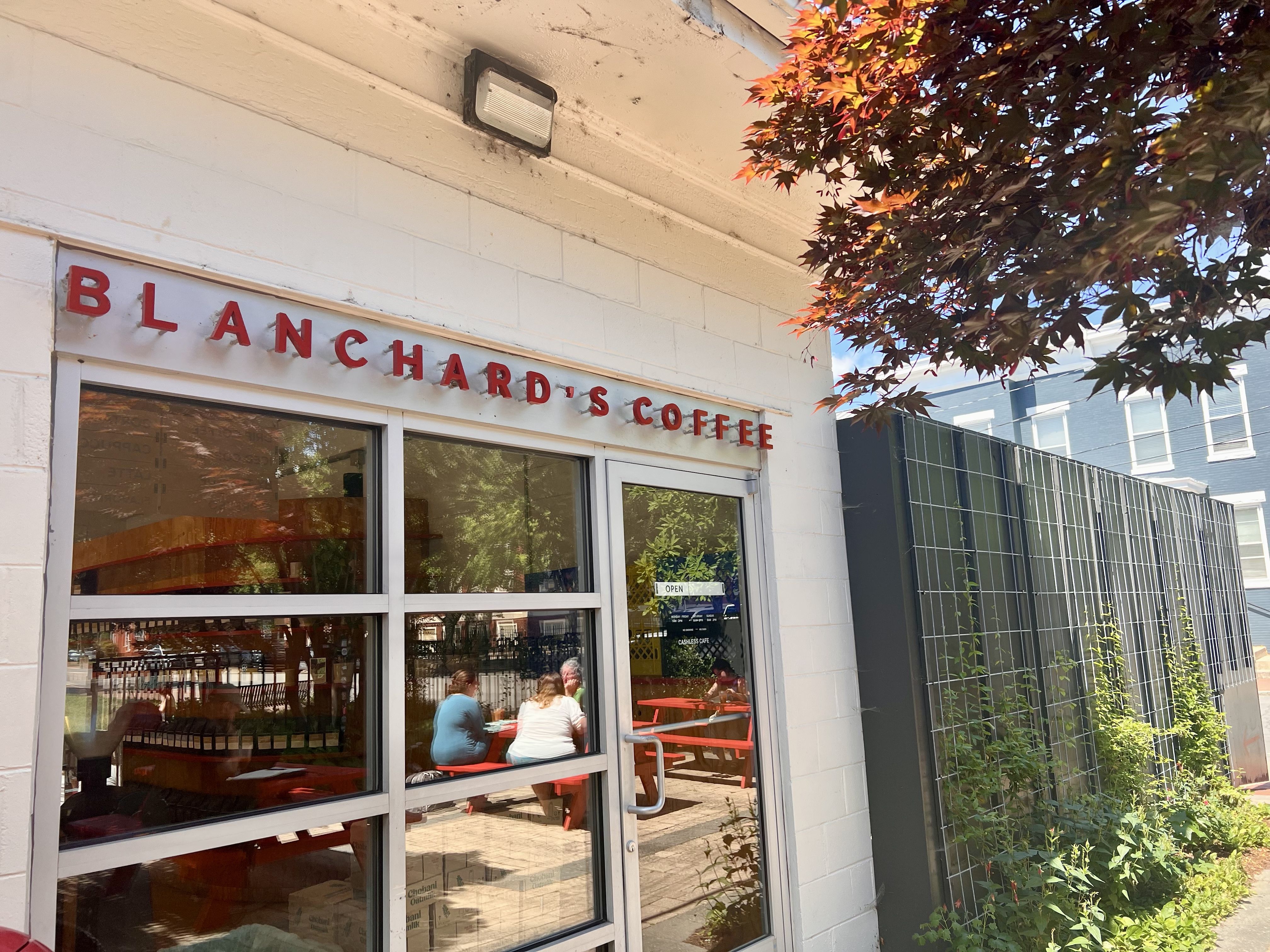 a coffee shop with the words "blanchard's coffee" in red