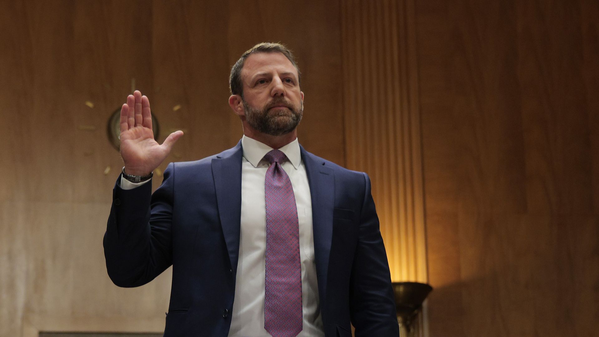 Sen. Markwayne Mullin (R-OK) is sworn in as he testifies during a confirmation hearing to be the next Secretary of the Department of Homeland Security