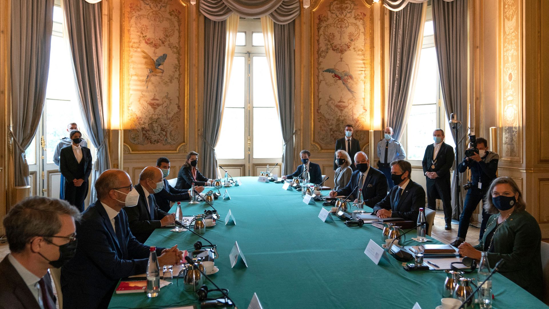 Secretary of State Antony Blinken is seen meeting in Paris with the French foreign minister.