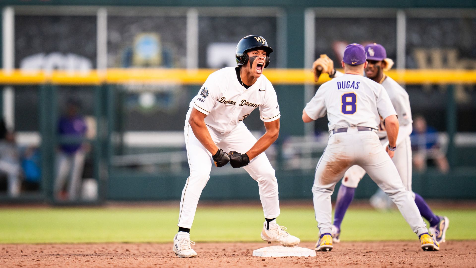 wake forest player celebrates a hit