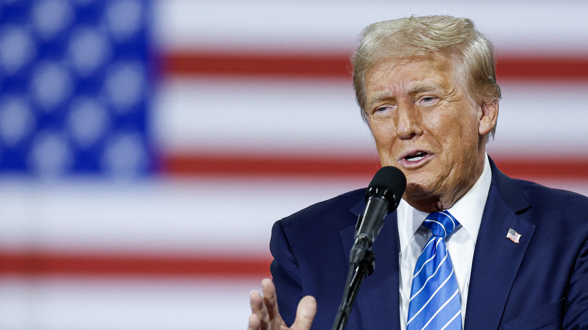 Former US President and Republican presidential candidate Donald Trump speaks during a campaign event at Dane Manufacturing in Waunakee, Wisconsin, October 1, 2024. 