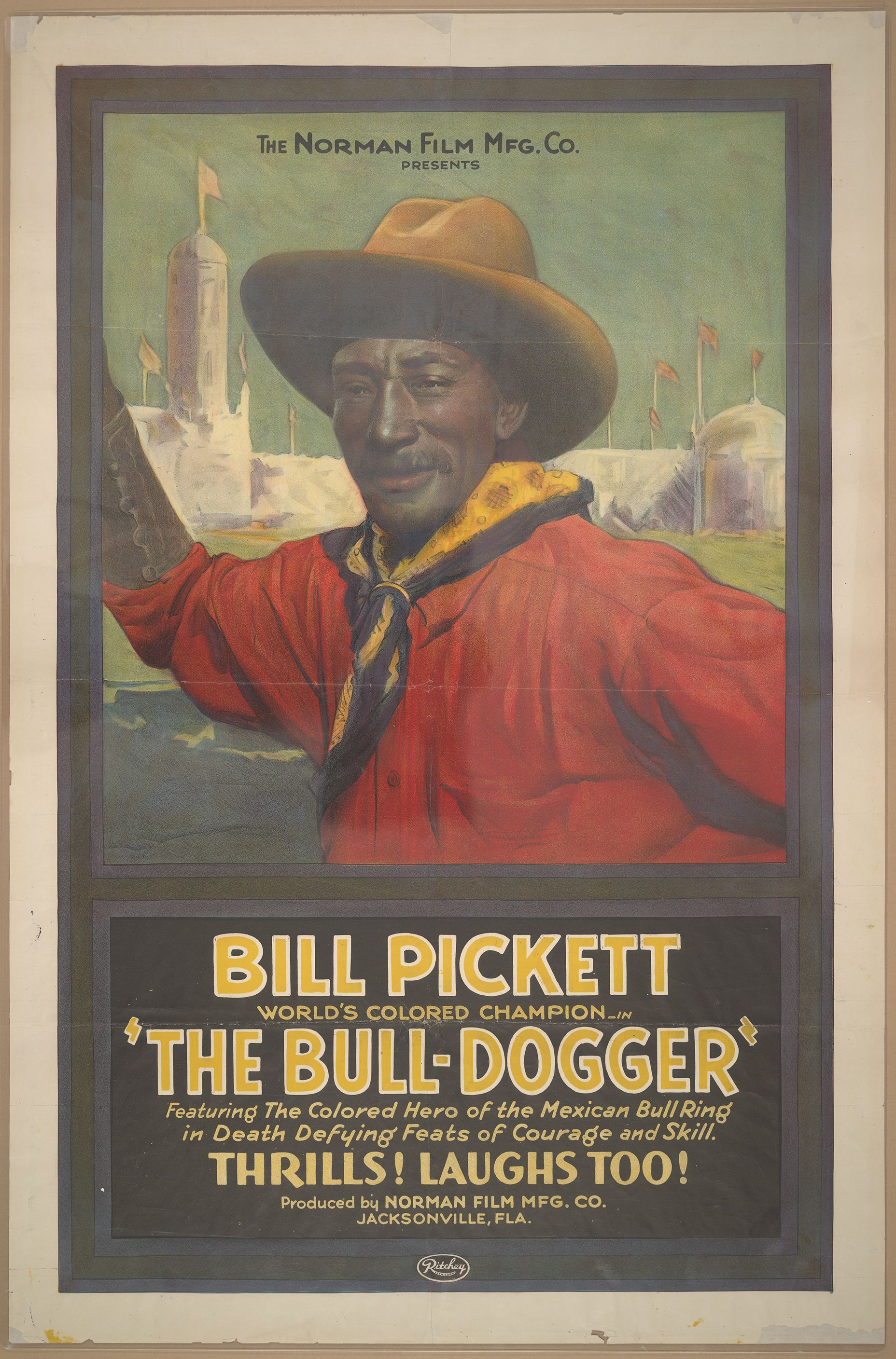 Photo of a movie poster featuring America's first black cowboy movie star Bill Pickett.