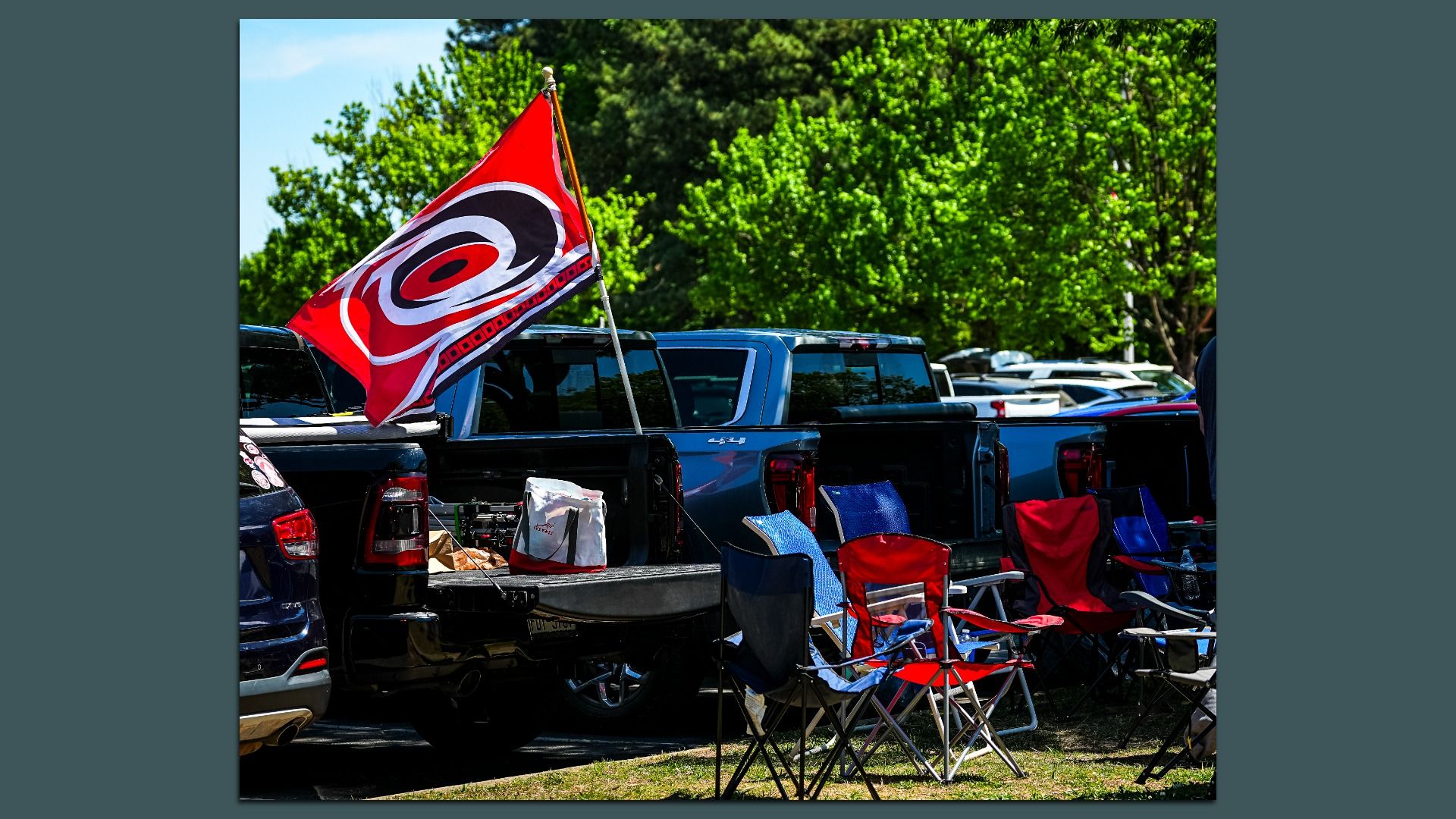 RALEIGH, NORTH CAROLINA - APRIL 18: Carolina Hurricanes flag is hung on a vehicle outside Lenovo Center for Game One of the First Round of the 2026 Stanley Cup Playoffs between the Carolina Hurricanes and the Ottawa Senators on April 18, 2026 in Raleigh, North Carolina. (Photo by NHL Images/NHLI via