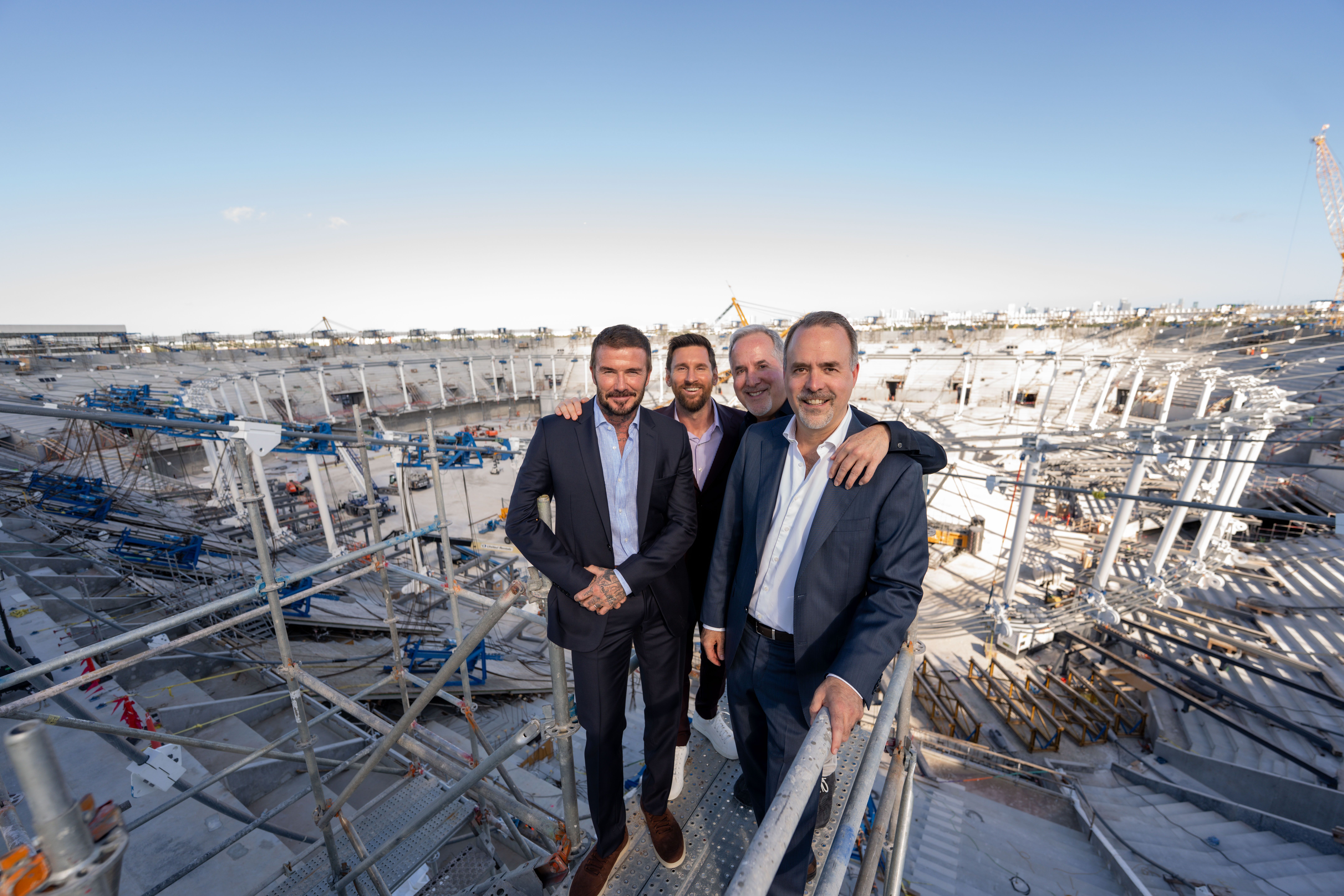 Lionel Messi with Inter Miami's ownership group — David Beckham, Jorge Mas and Jose Mas — at the new Miami Freedom Park stadium. Photo: Carlos Goldman - Inter Miami CF/MLS via Getty Images