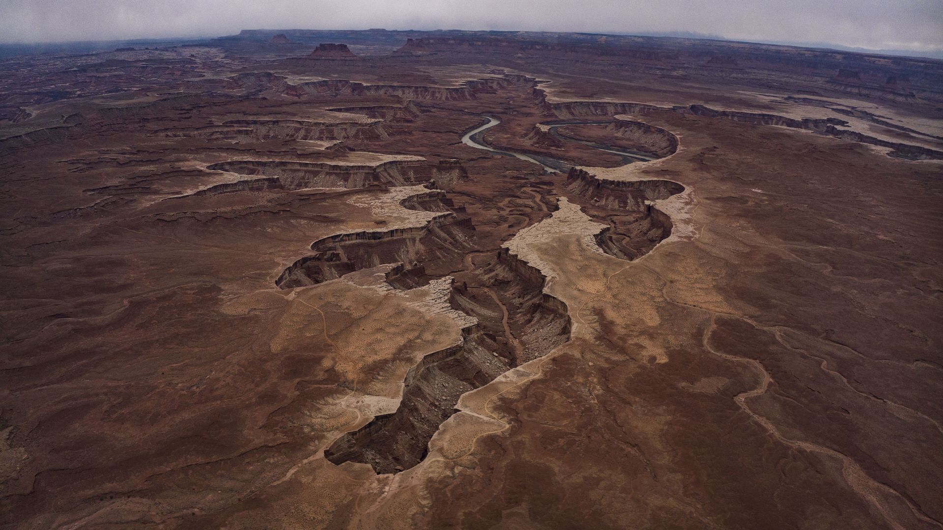 An aerial view of desert canyons.