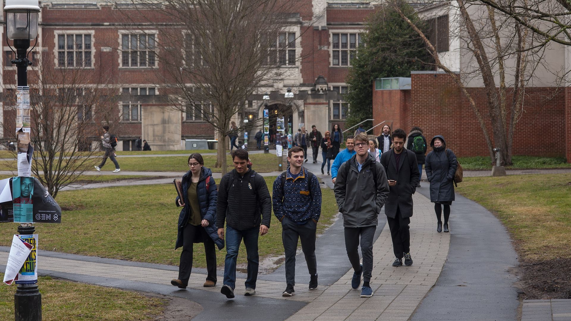 Students walk on campus at Princeton University on February 4, 2020 in Princeton, New Jersey. The university said over 100 students, faculty, and staff who recently traveled to China must 'self-isolate' themselves for 14 days to contain any possible exposure to the novel coronavirus. (Photo by Willi