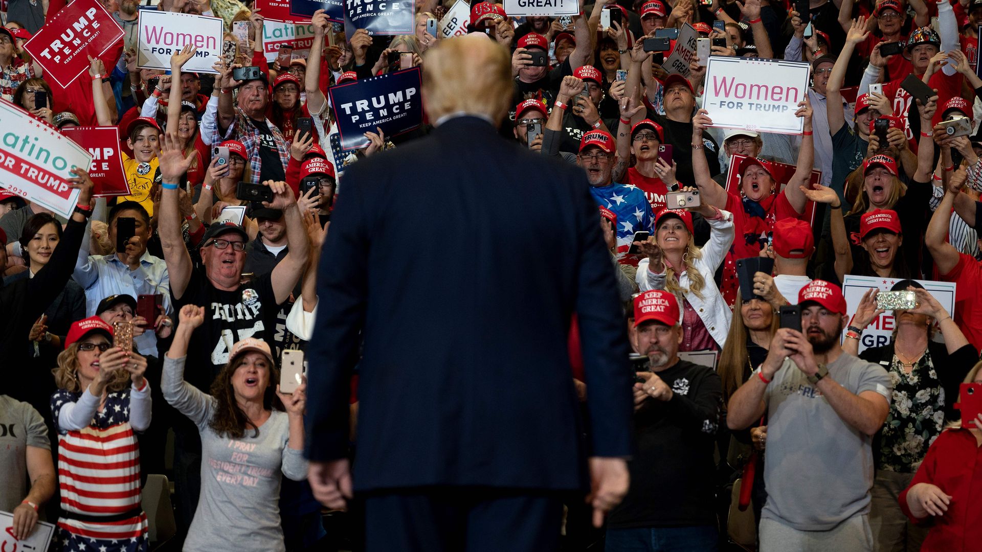 Supporters cheer as US President Donald Trump arrives to deliver remarks at a Keep America Great rally in Las Vegas, Nevada, on February 21,