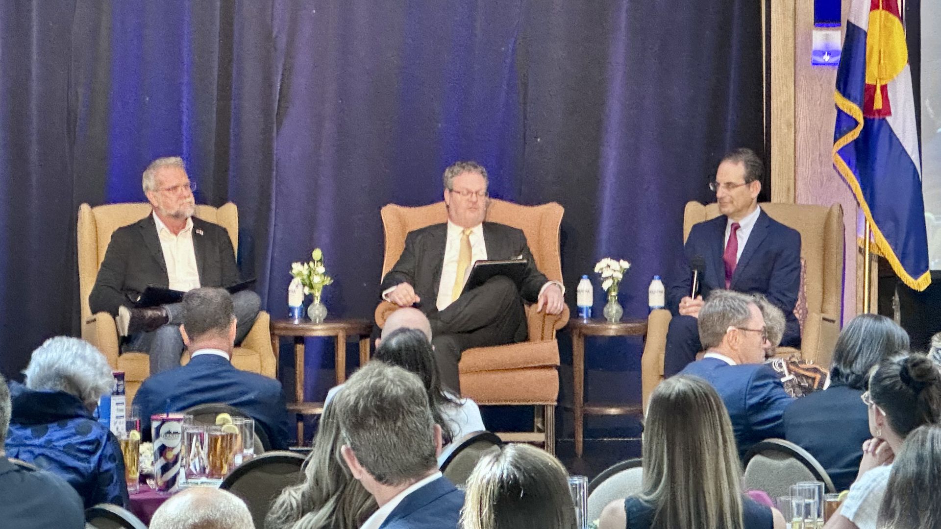 Victor Marx, left, and Phil Weiser, right, appear at the lone gubernatorial forum in the 2026 election. Photo: John Frank/Axios