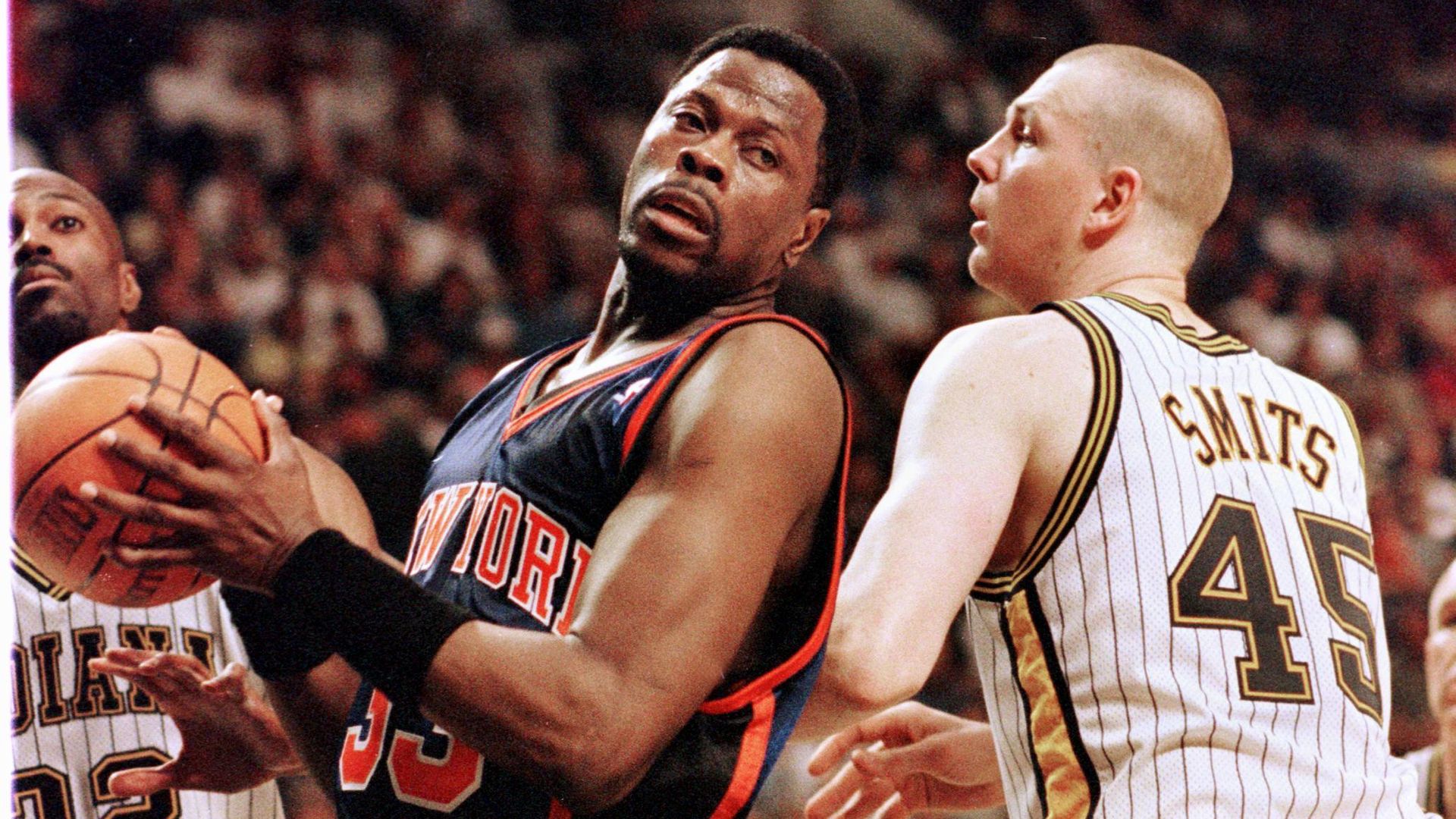 Patrick Ewing backing down Rick Smits