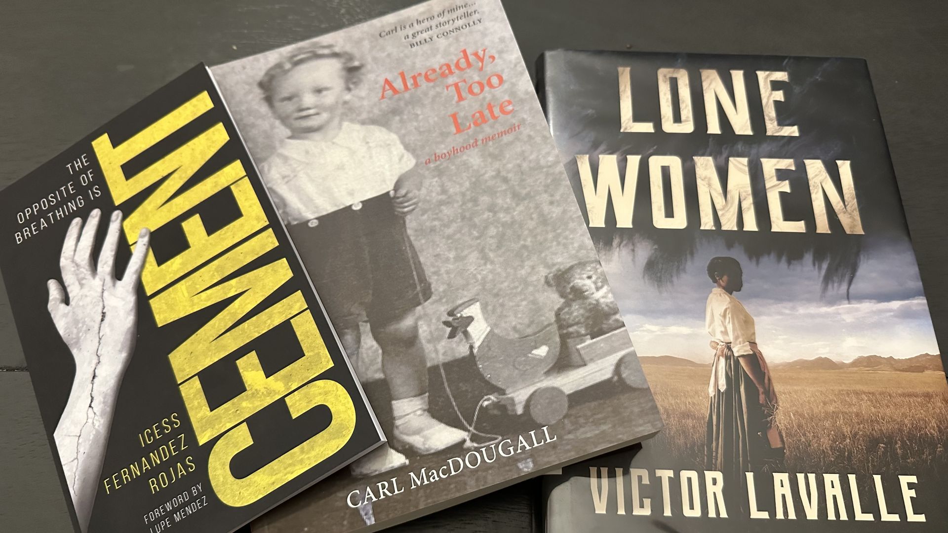 Collection of books on a table.