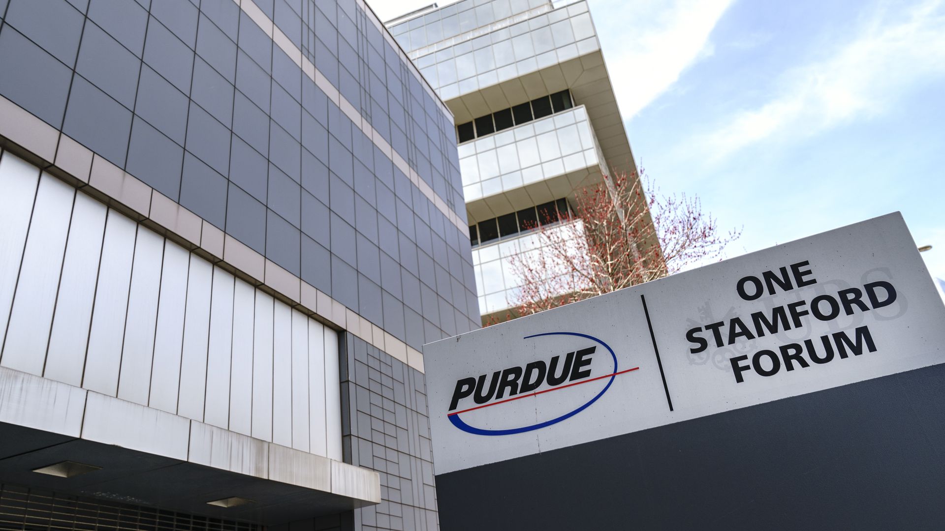Purdue logo and sign outside of a headquarters building.