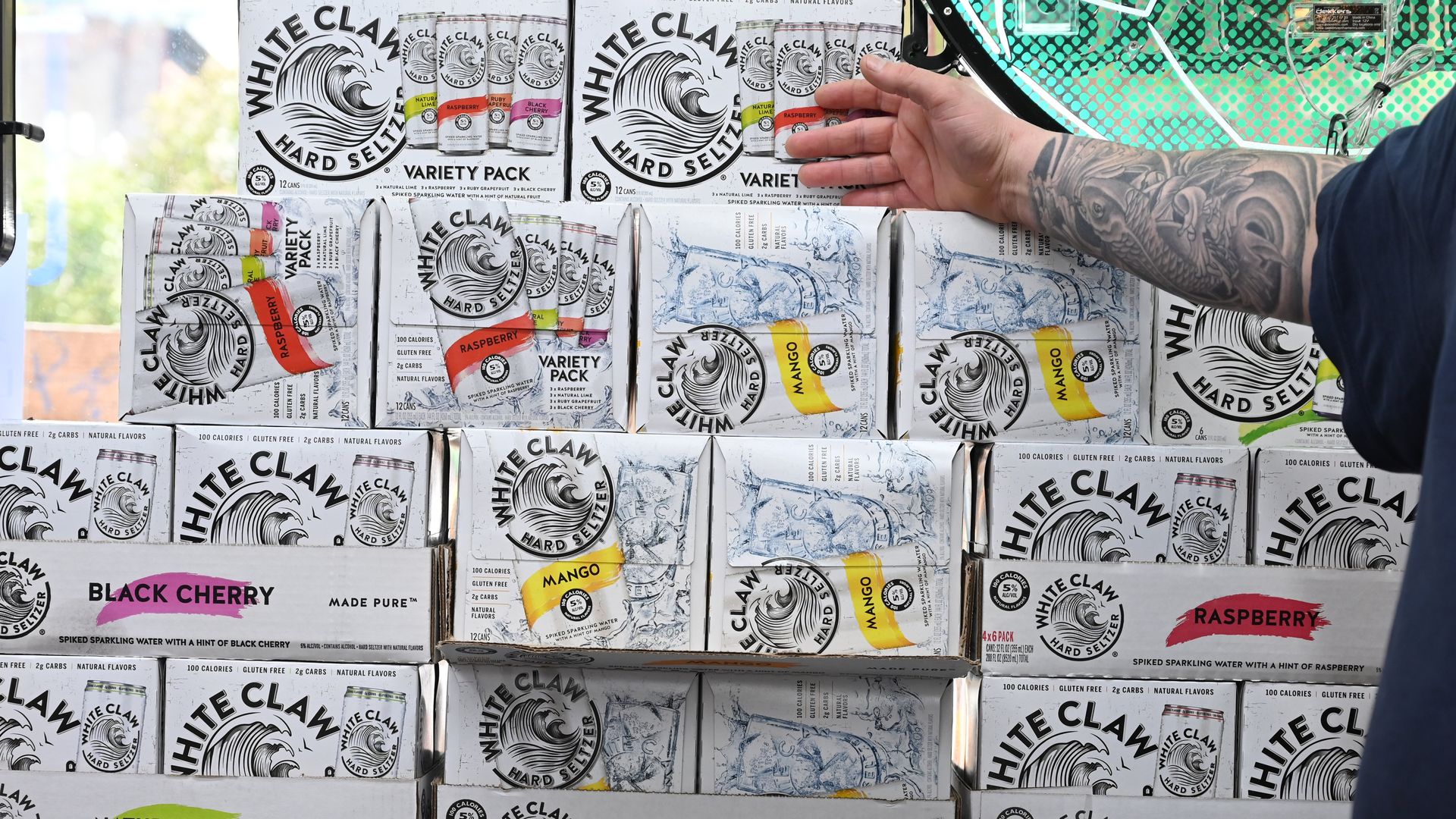 A stack of cases of White Claw