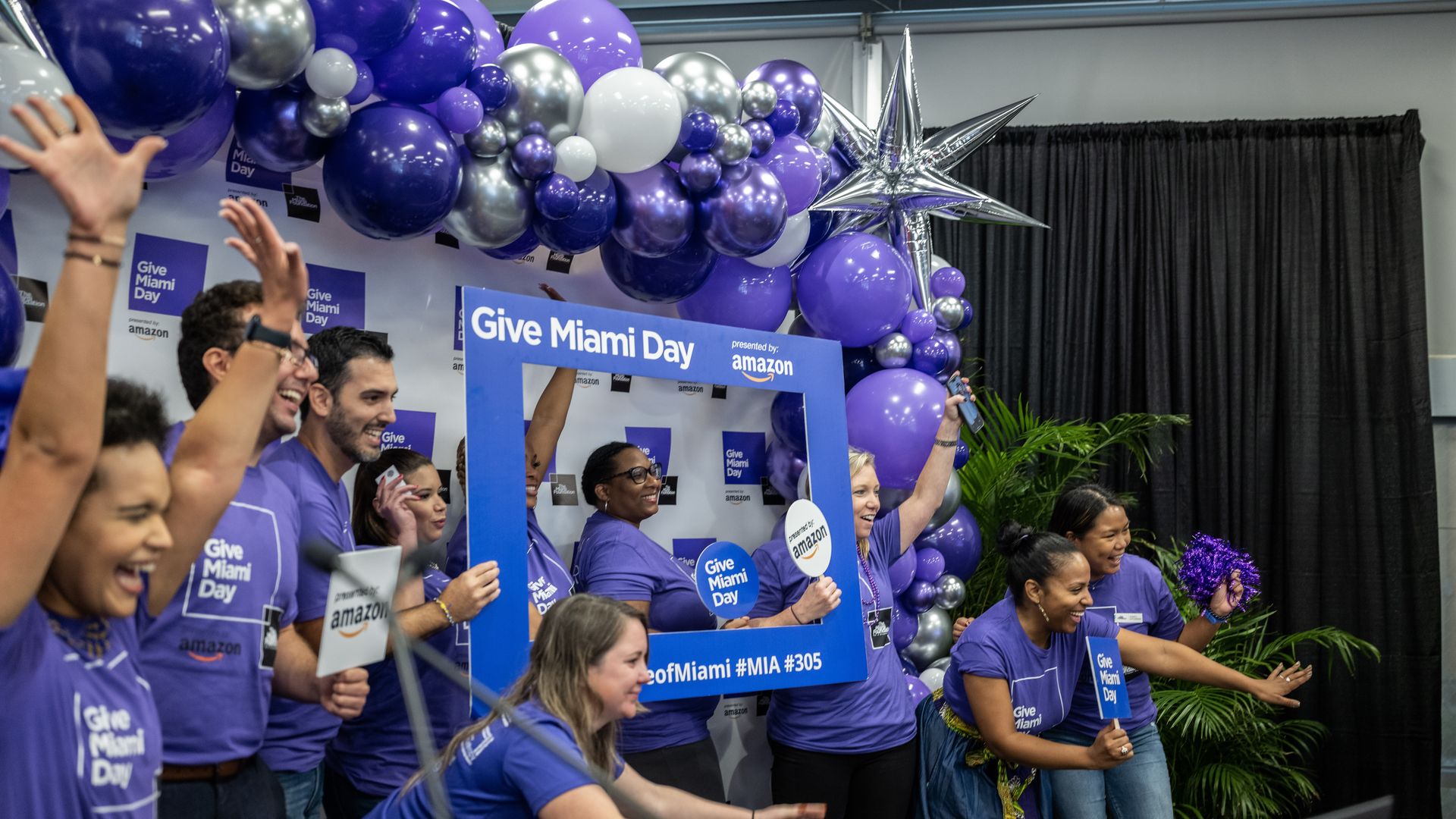 Miami Foundation employees celebrate a fundraiser.