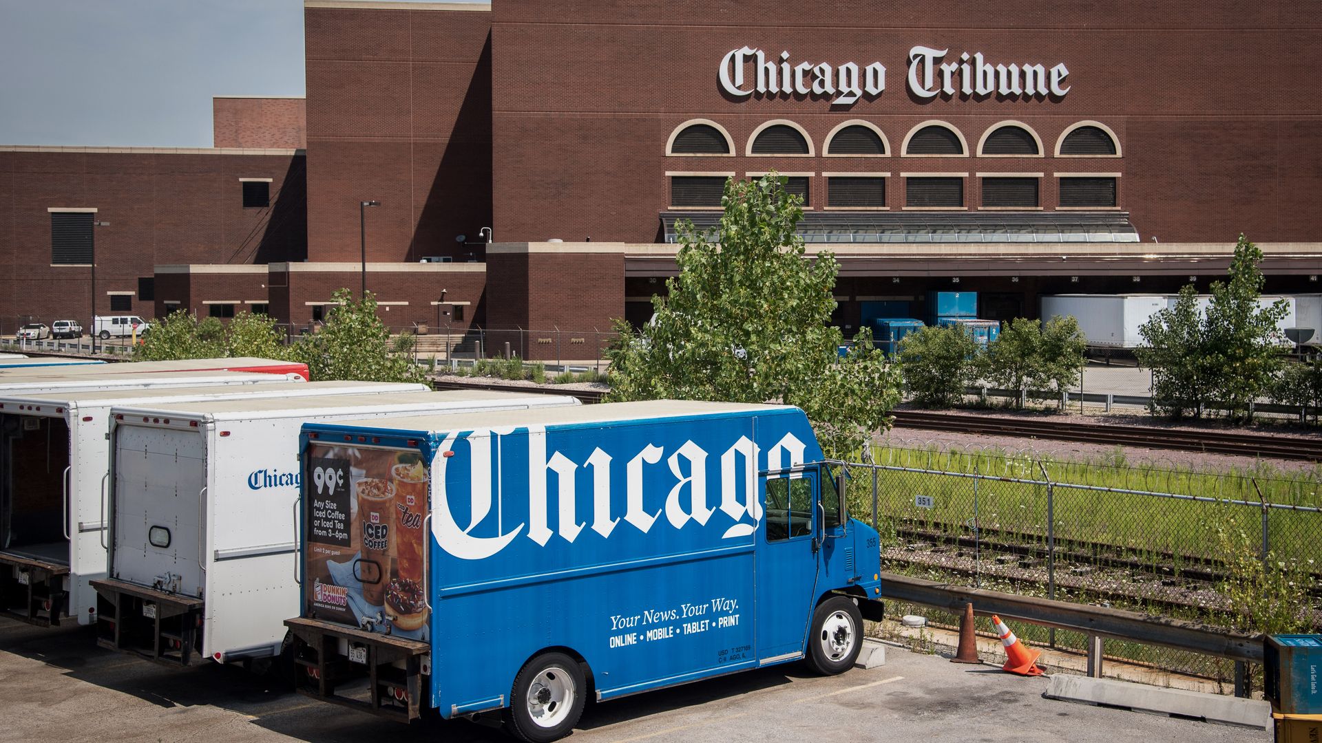 Photo of a truck parked in front of a building