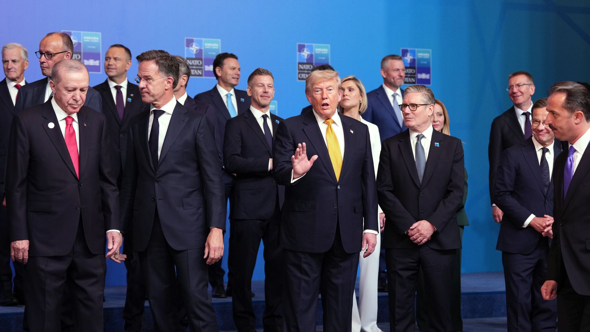 President Trump speaks during the "family photo" today at the NATO summit in Ankara, Turkey.