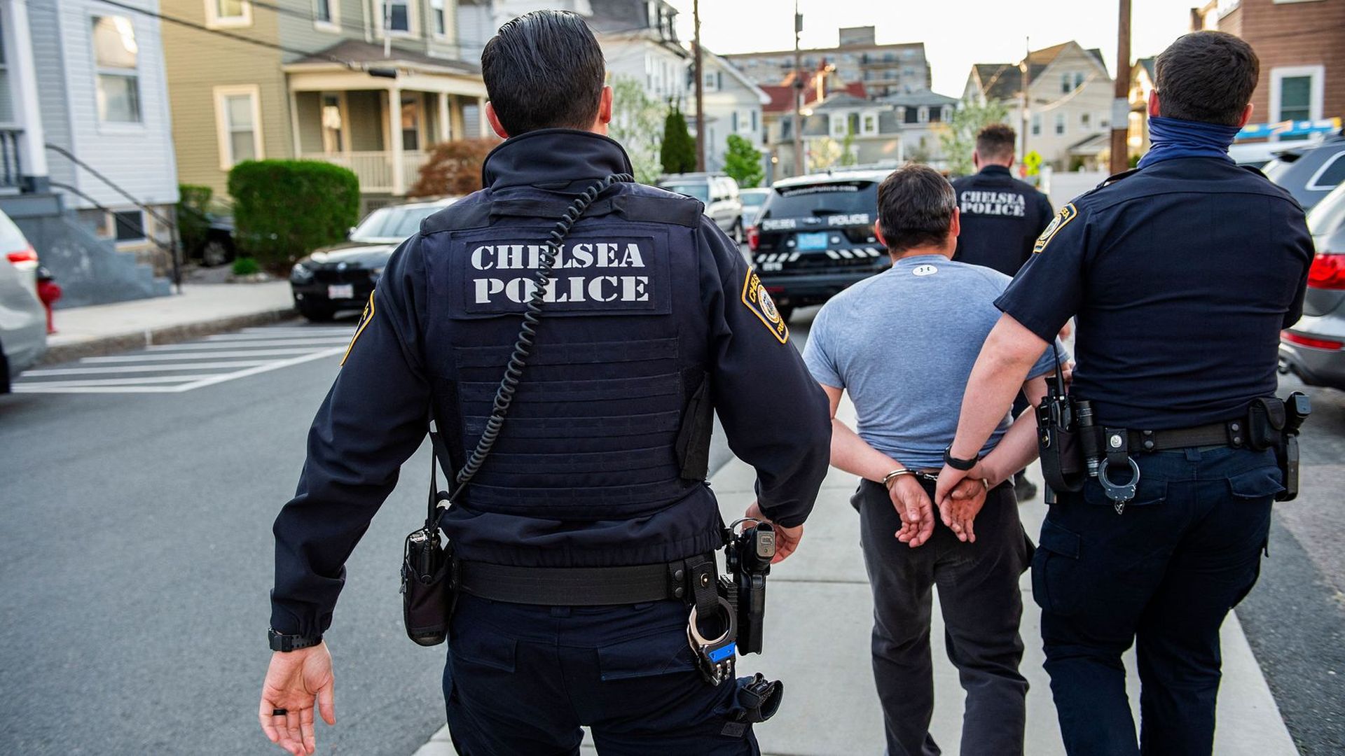 Officers arrest a man in predominately Latino city of Chelsea, Massachusetts on May 1, 2021. Photo: Joseph Prezioso/AFP via Getty Images