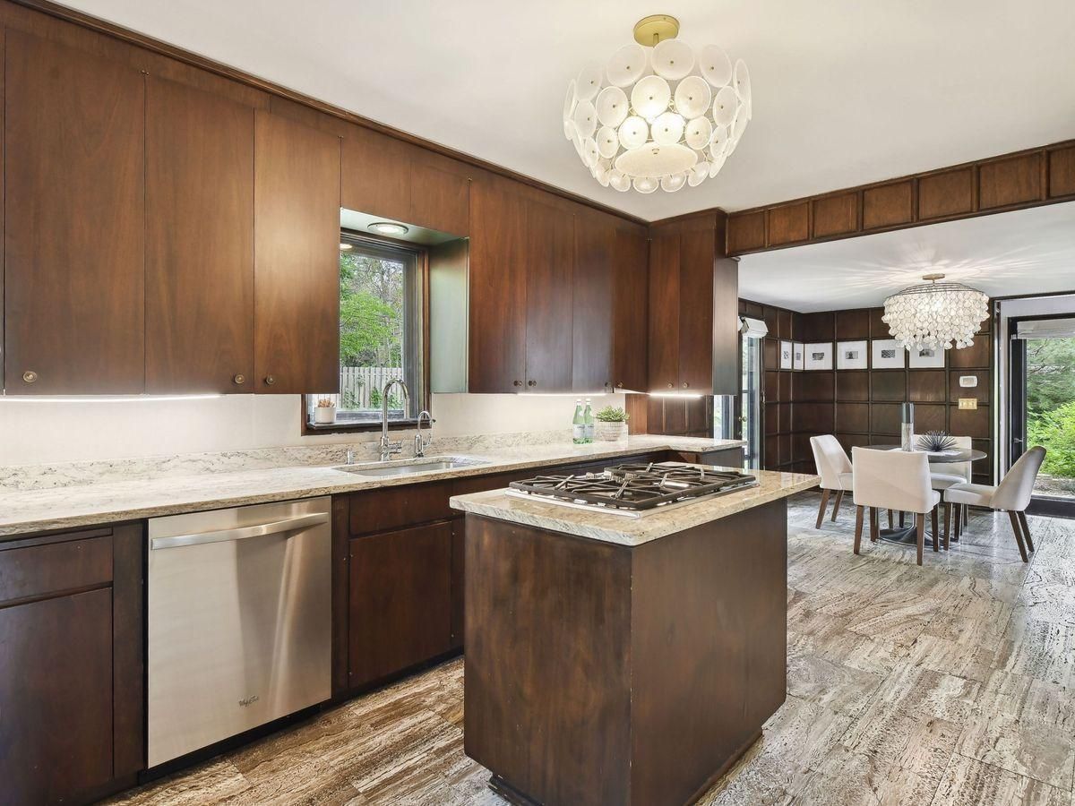 modern kitchen with view of eating area