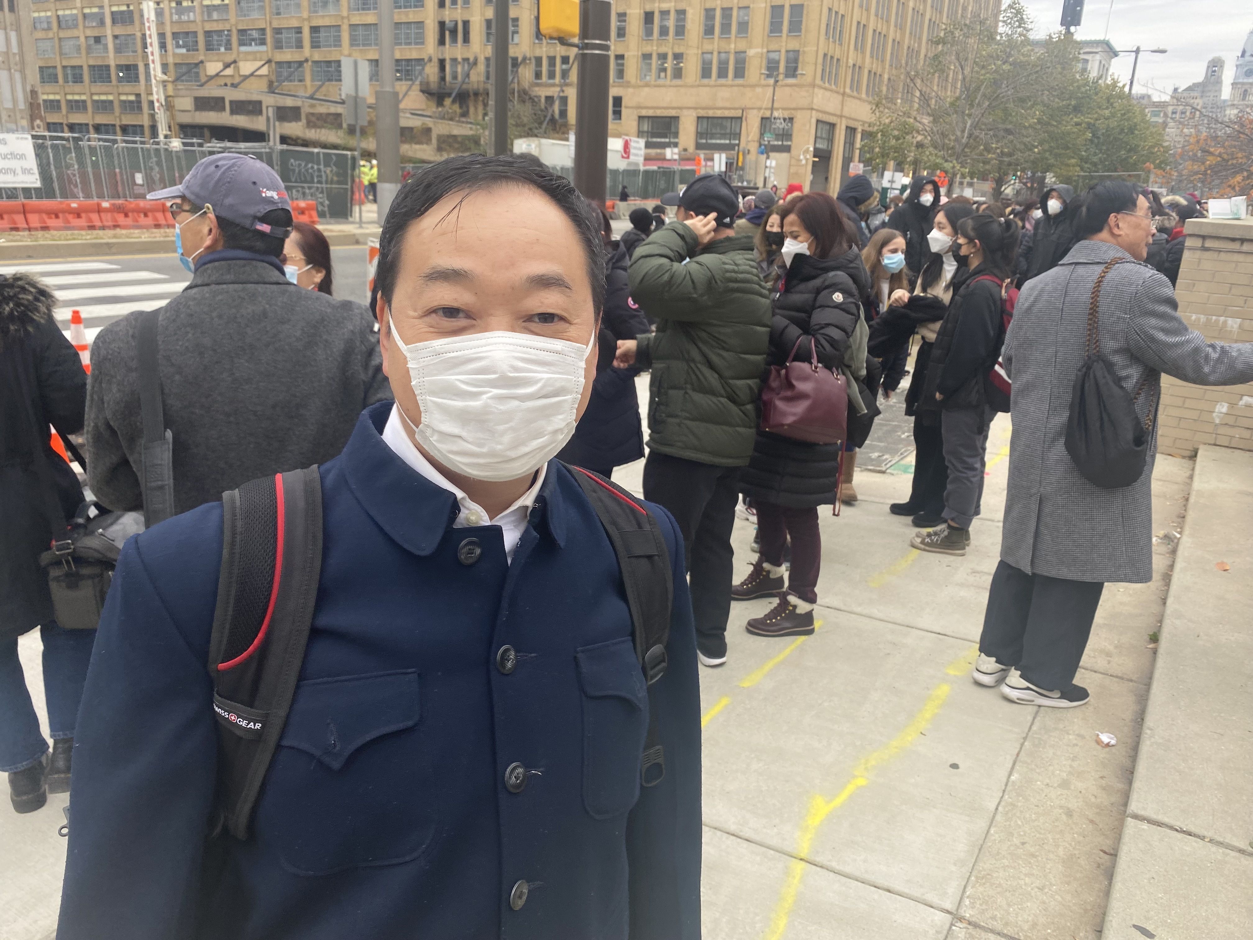 Matt Zhang from Northeast Philadelphia came out to support Christina Lu. Photo: Taylor Allen/Axios