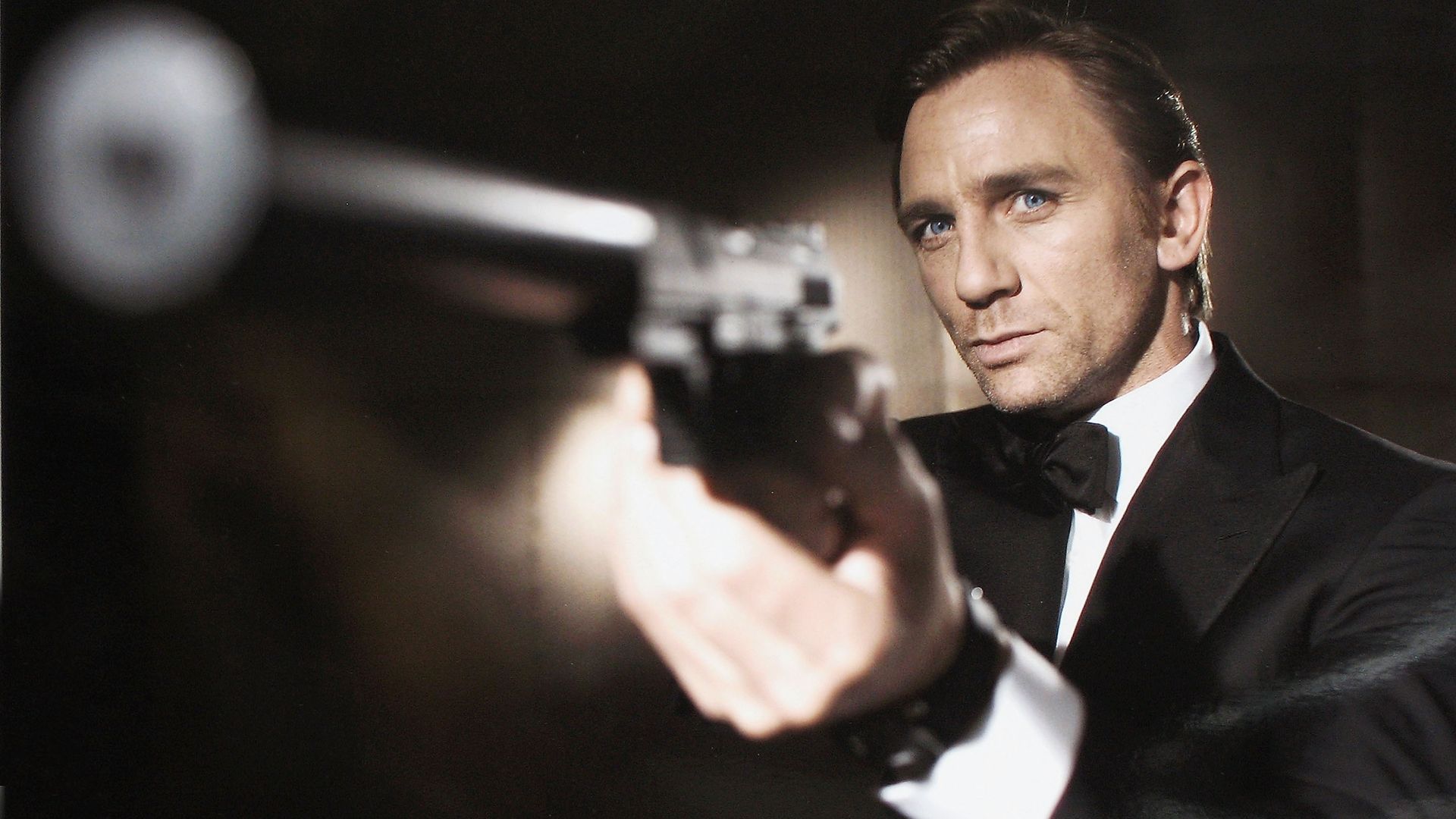James Bond, with gun
