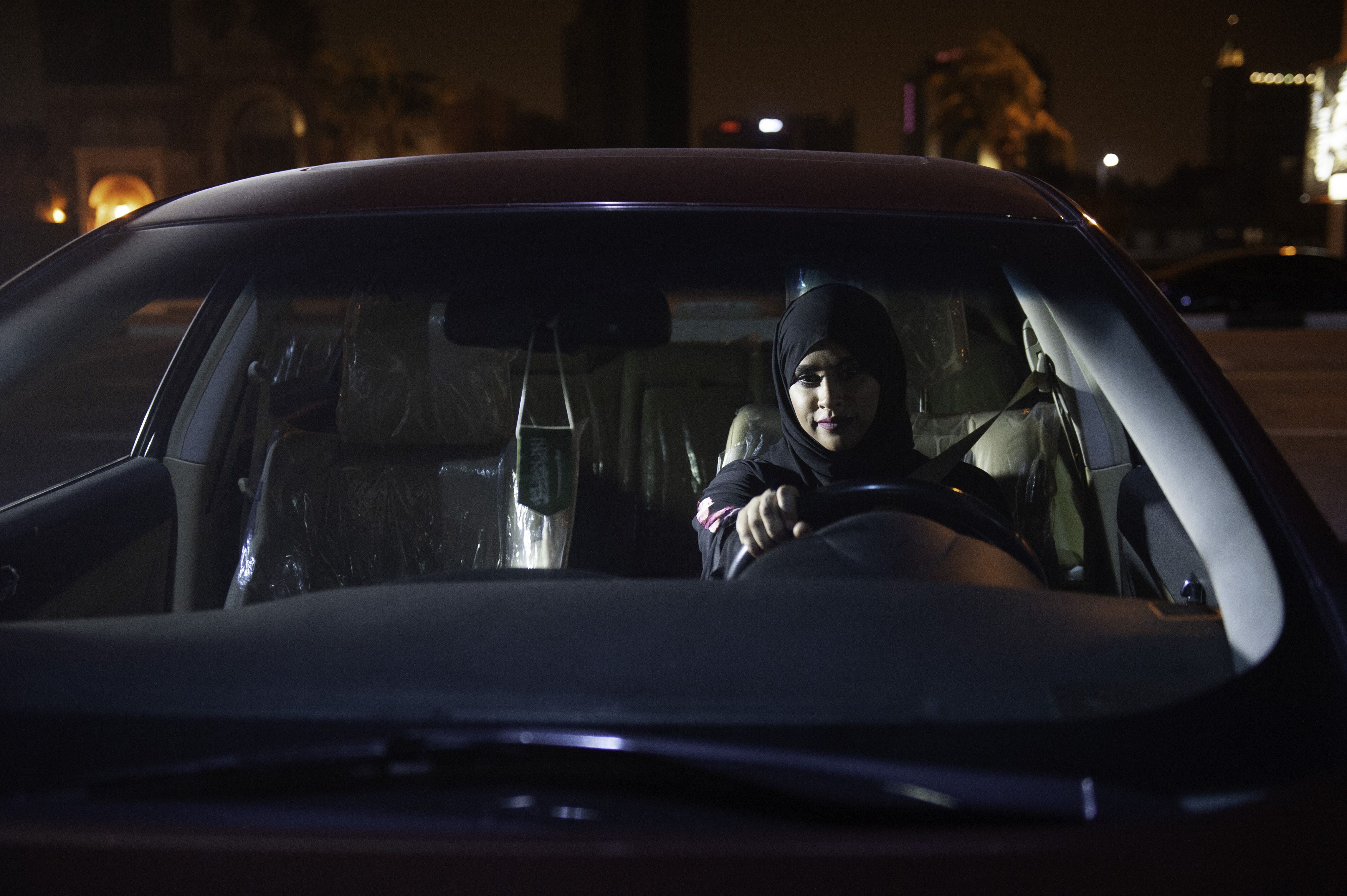 Saudi woman driving by herself. 