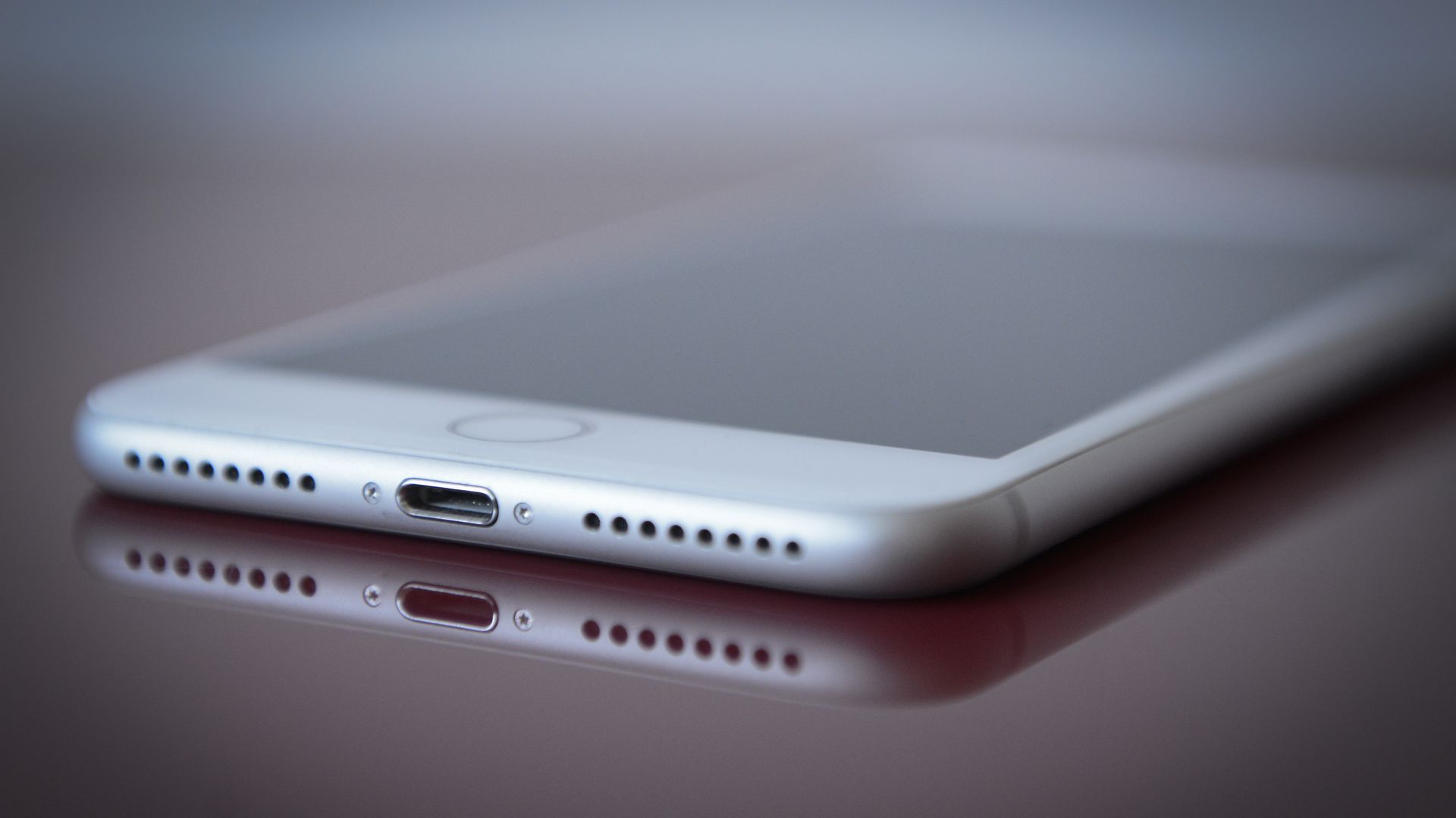 iPhone 8 viewed with Lightning port in foreground