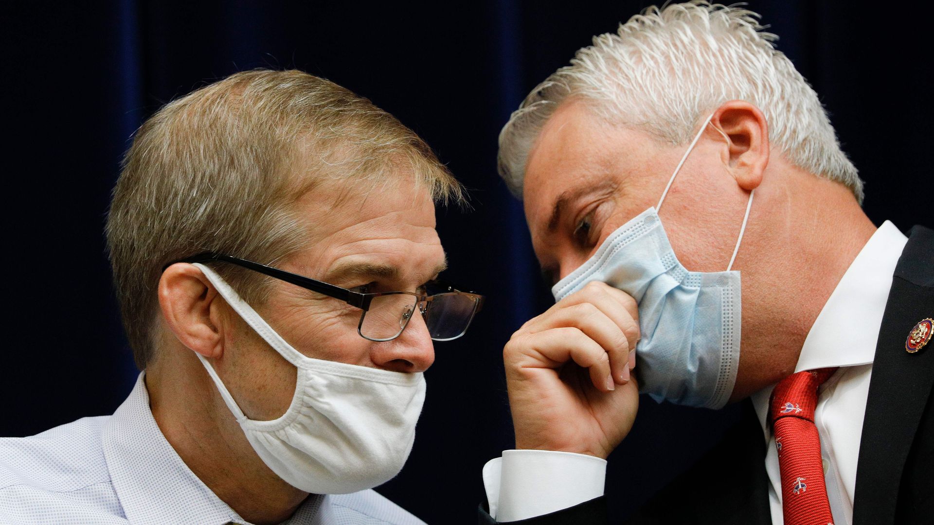 Rep. Jim Jordan (R-OH) speaks to Ranking Committee Member James Comer (R-KY) during a House Oversight and Reform Committee hearing