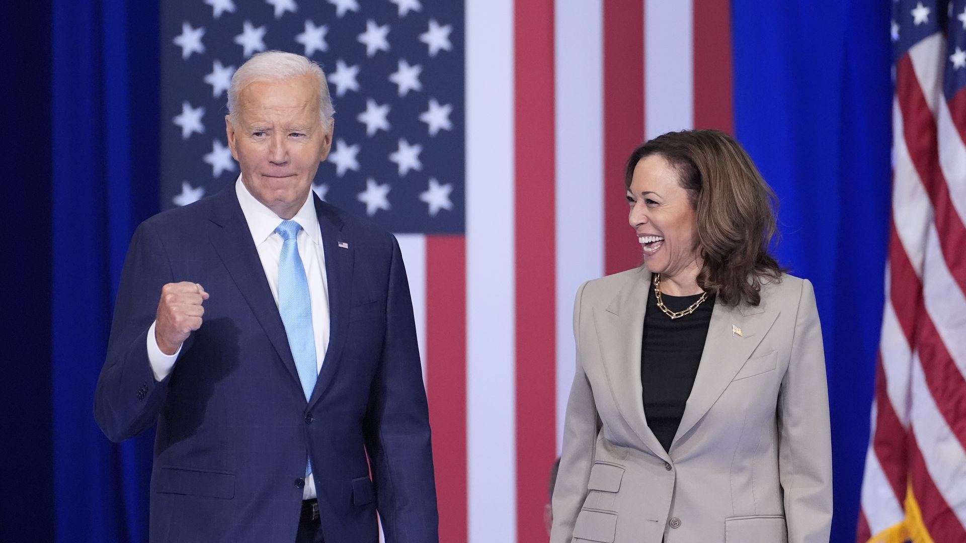 President Joe Biden and Vice President Kamala Harris arrive to speak about their administration's efforts to lower prescription drug costs during an event at Prince George's Community College in Largo, Md