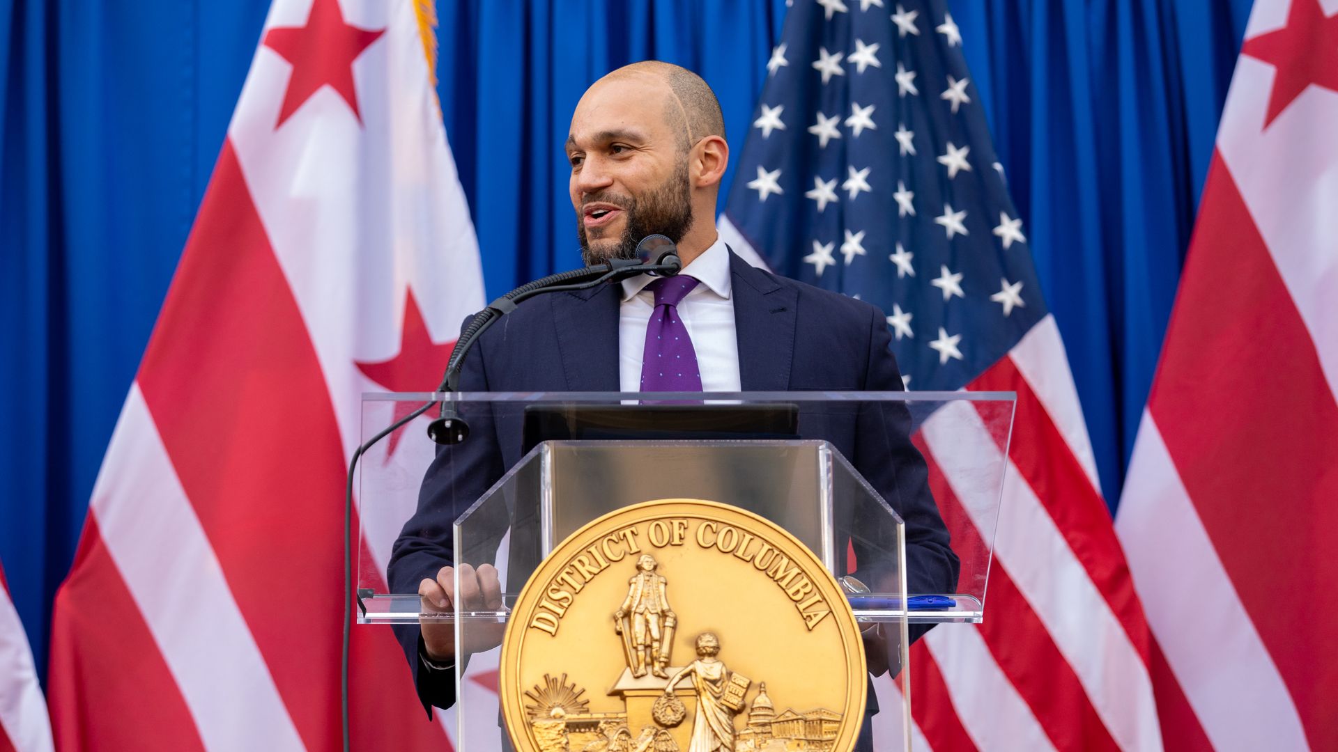 At-large D.C. Council member Robert White at a lectern.