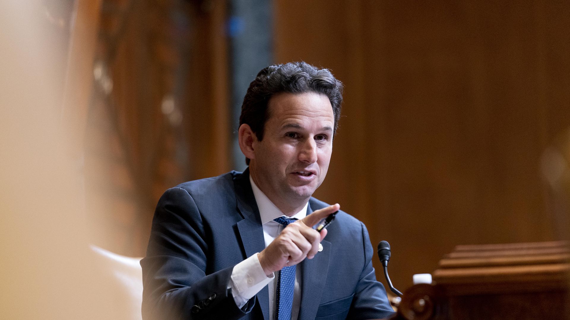 Sen. Brian Schatz speaks as Commerce Secretary Gina Raimondo testifies before a Senate Appropriations subcommittee hearing.