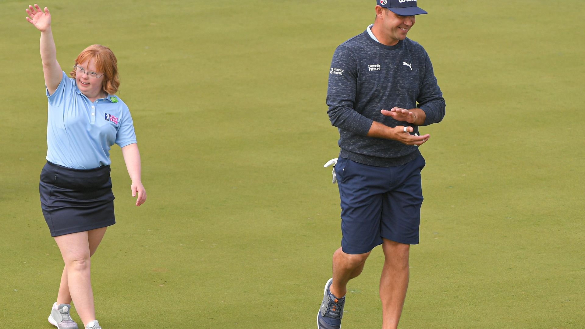 my Bockerstette and Gary Woodland walk together to the 16th green prior to the Waste Management Phoenix Open at TPC Scottsdale on January 29, 2020 in Scottsdale, Arizona.
