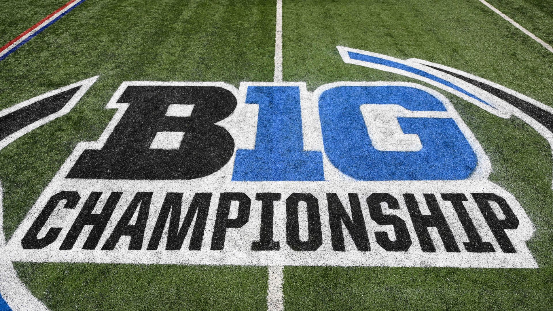 The Big Ten championship logo on a football field