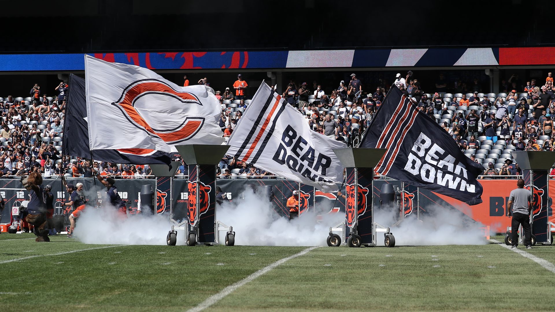 Photo of flags at a football stadium. 