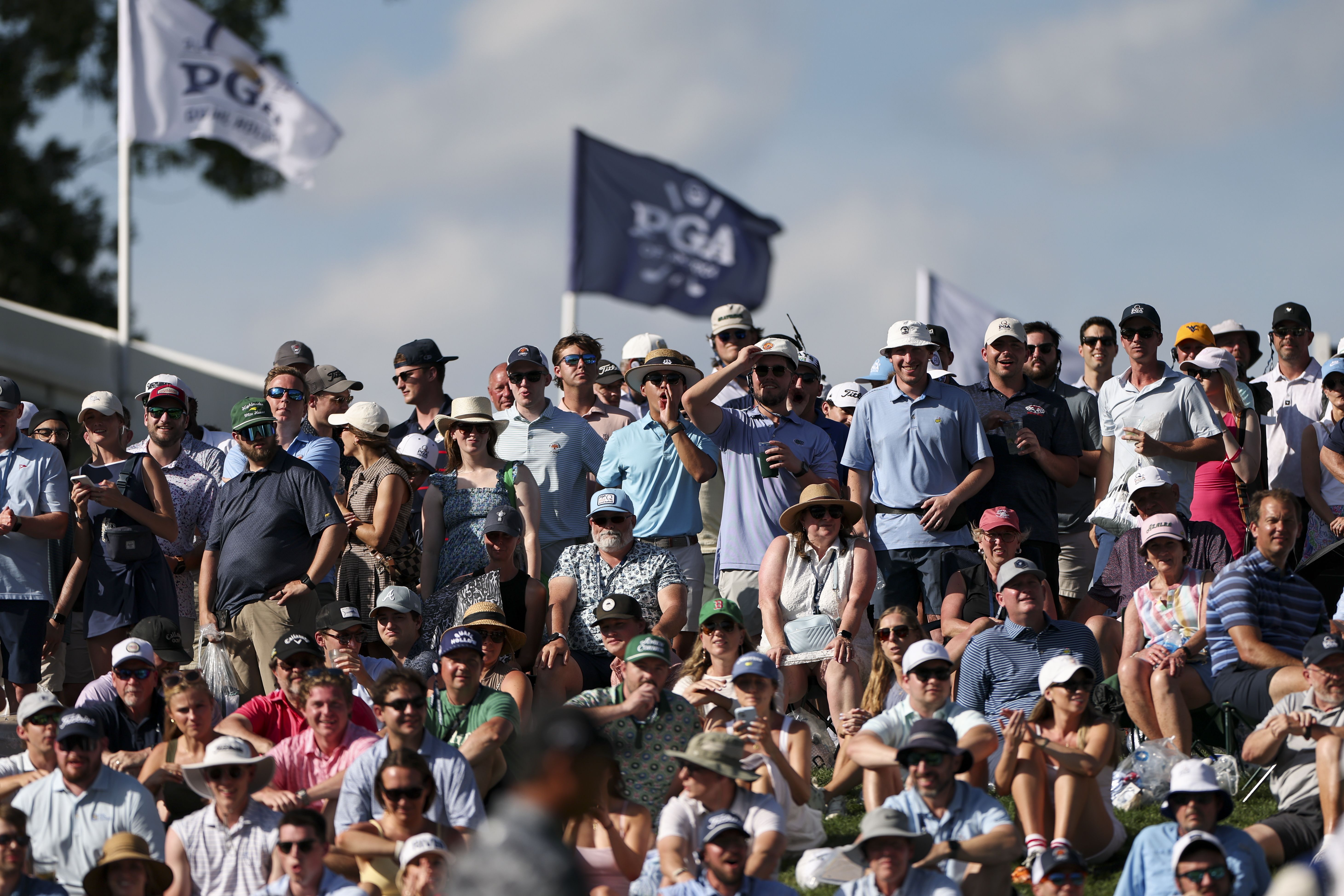 Spectators cheer on the 13th hole during the third round of the PGA Championship at Quail Hollow Club on Saturday, May 17, 2025 in Charlotte, North Carolina. (Photo by Scott Taetsch/PGA of America via Getty Images)