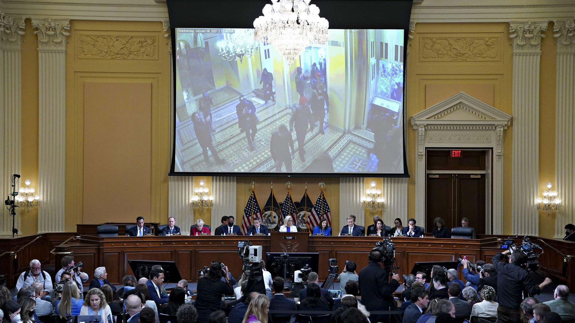 A video of Jan. 6 rioters inside the US Capitol displayed on a screen during a hearing of the Select Committee.