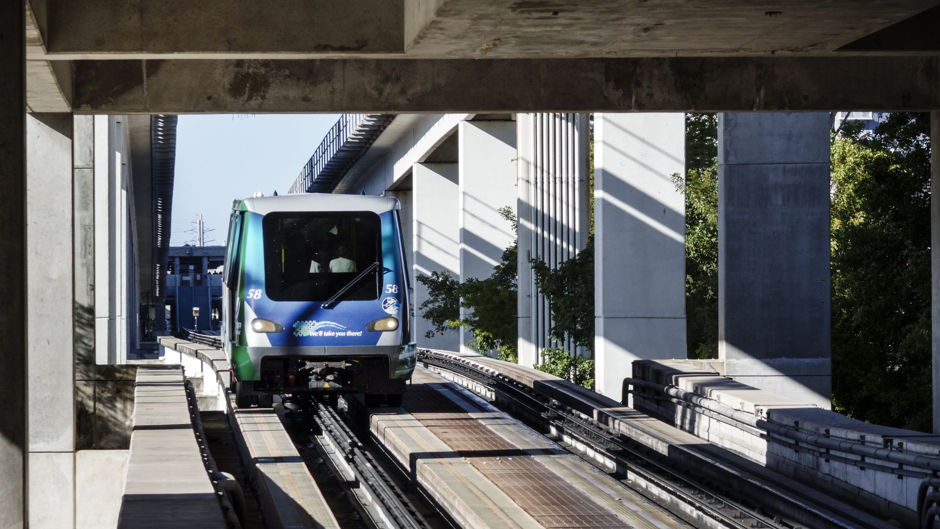 Miami-Dade's free MetroMover is pictured traveling along its rail.