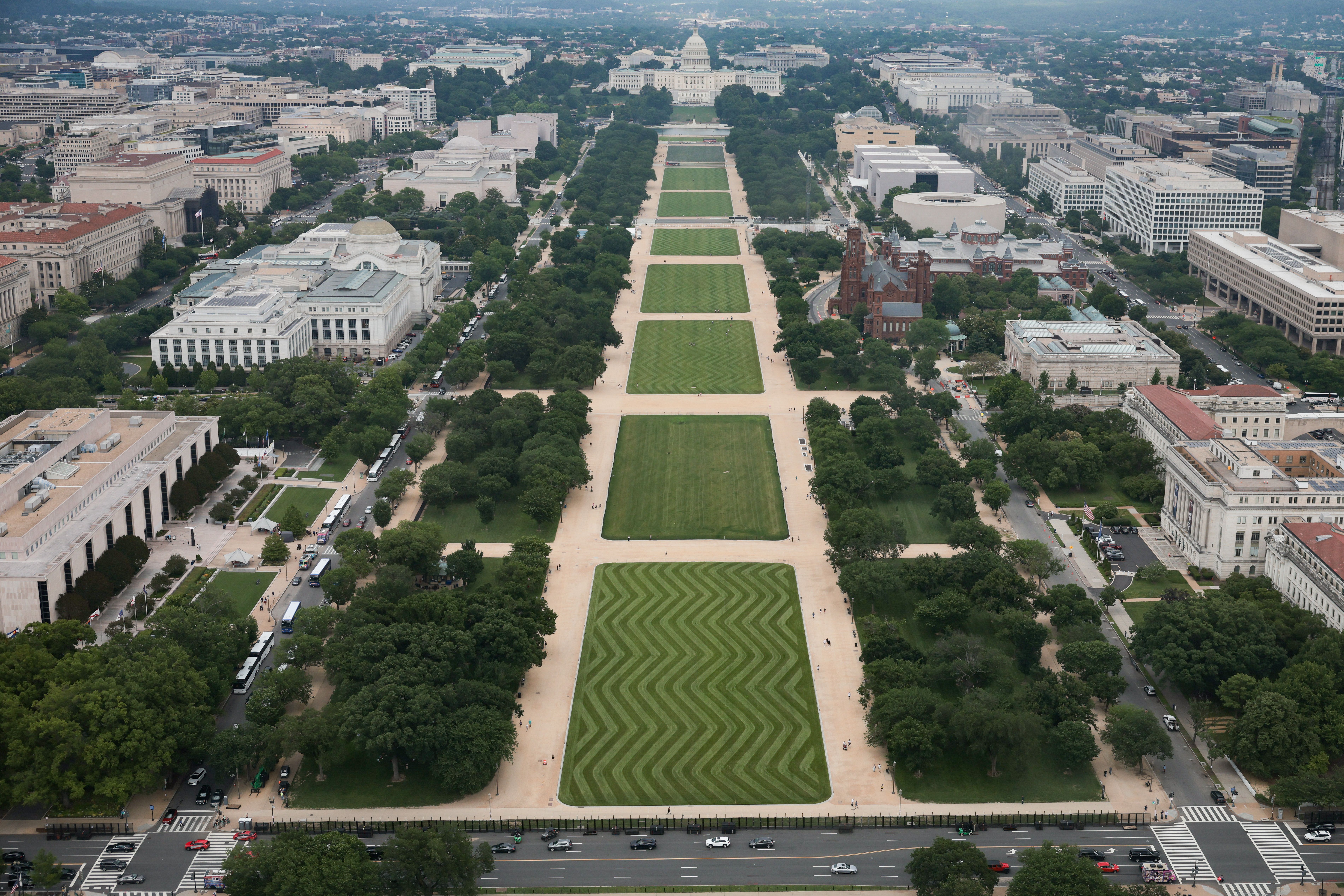 Temporary fencing is seen from the Washington Monument ahead of the Army's 250th birthday parade and celebration on the National Mall on June 09, 2025 in Washington, DC. The U.S. Army will mark its 250th anniversary with a parade along the National Mall that will include 6,500 troops, 150 vehicles a