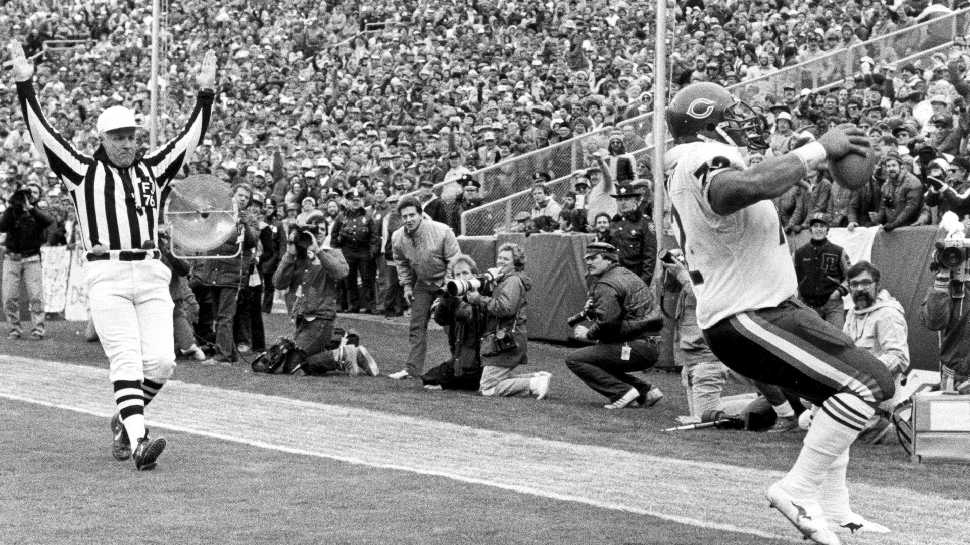 Black and white football footage of Bears.