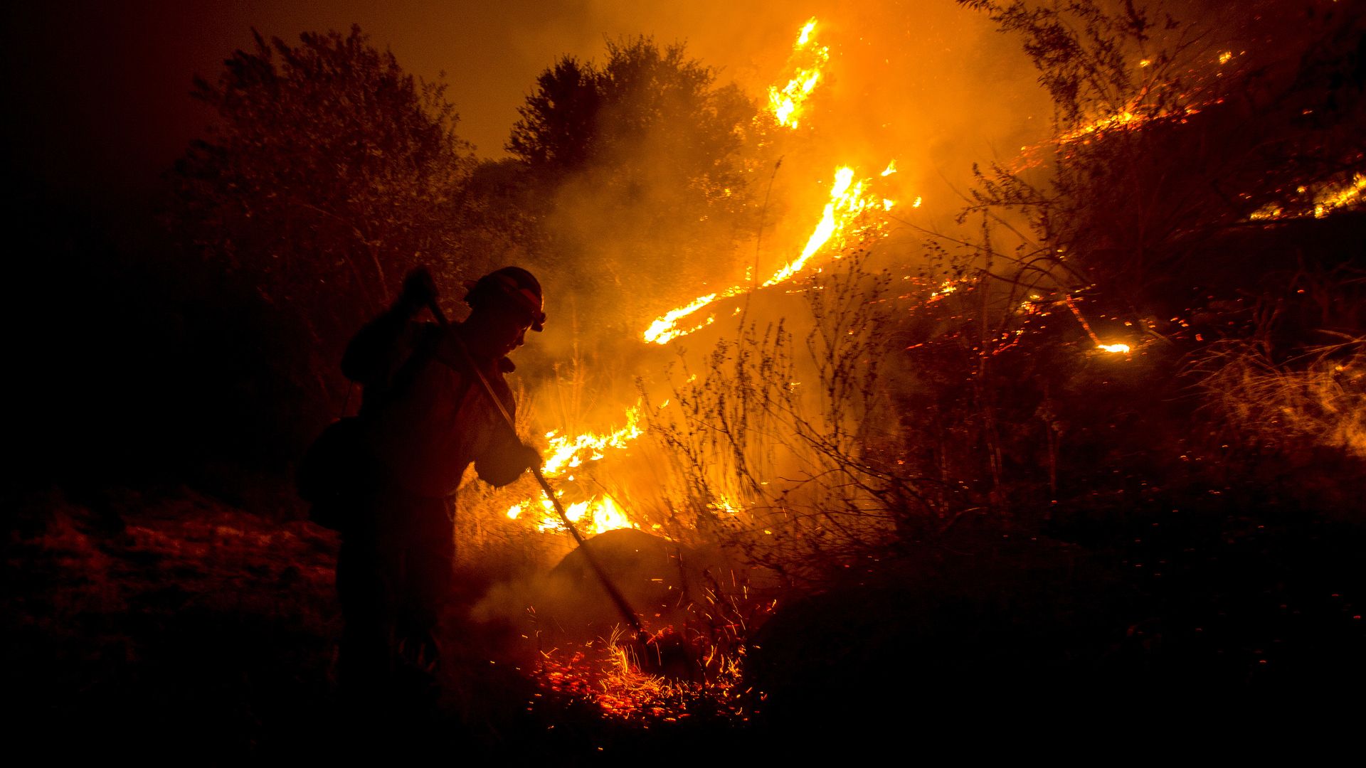 Photo of a firefighter at a wildfire in California on Sept. 15