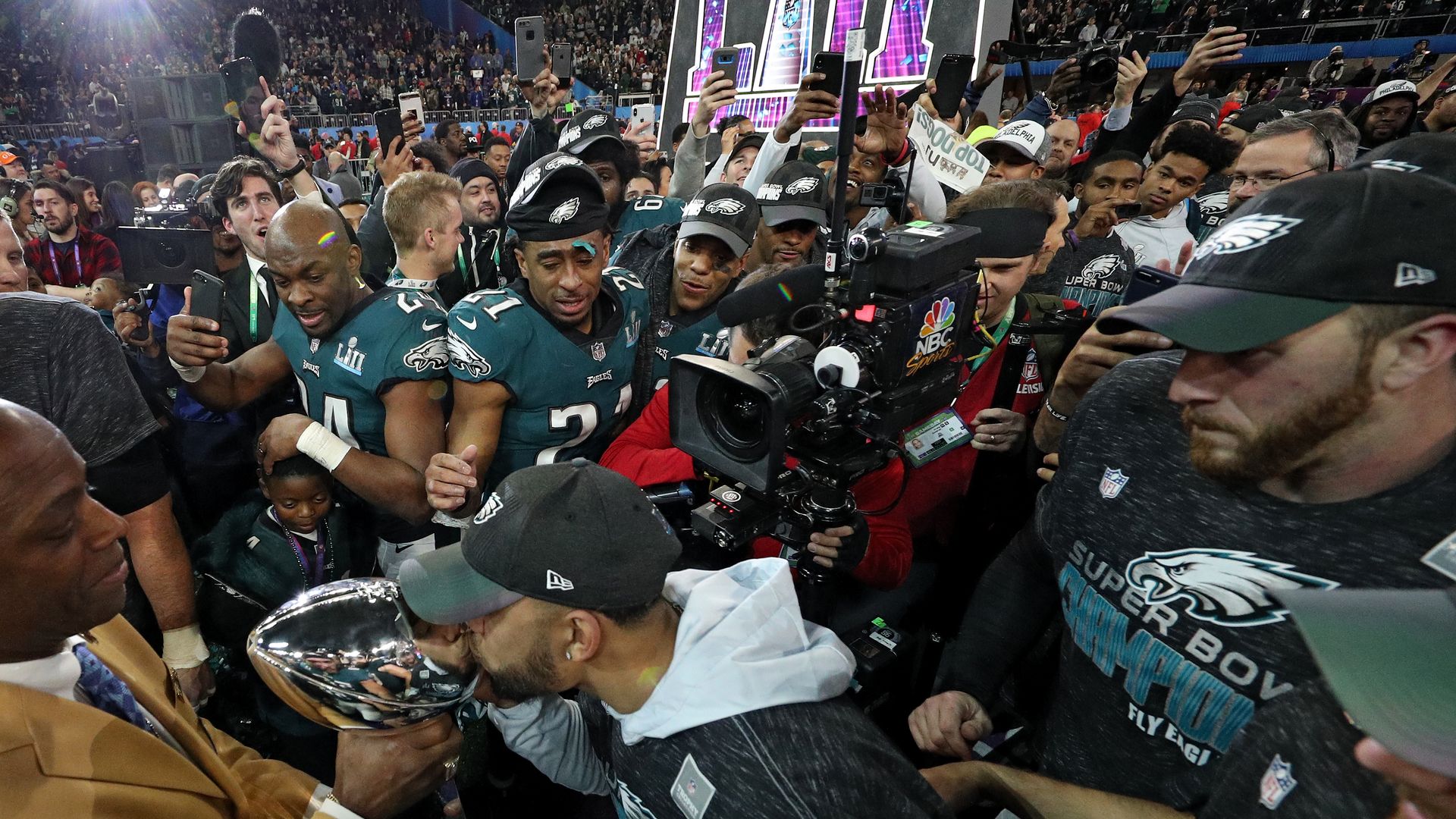 Philadelphia Eagles players kiss the Lombardi Trophy after defeating the New England Patriots in Super Bowl LII in February. 
