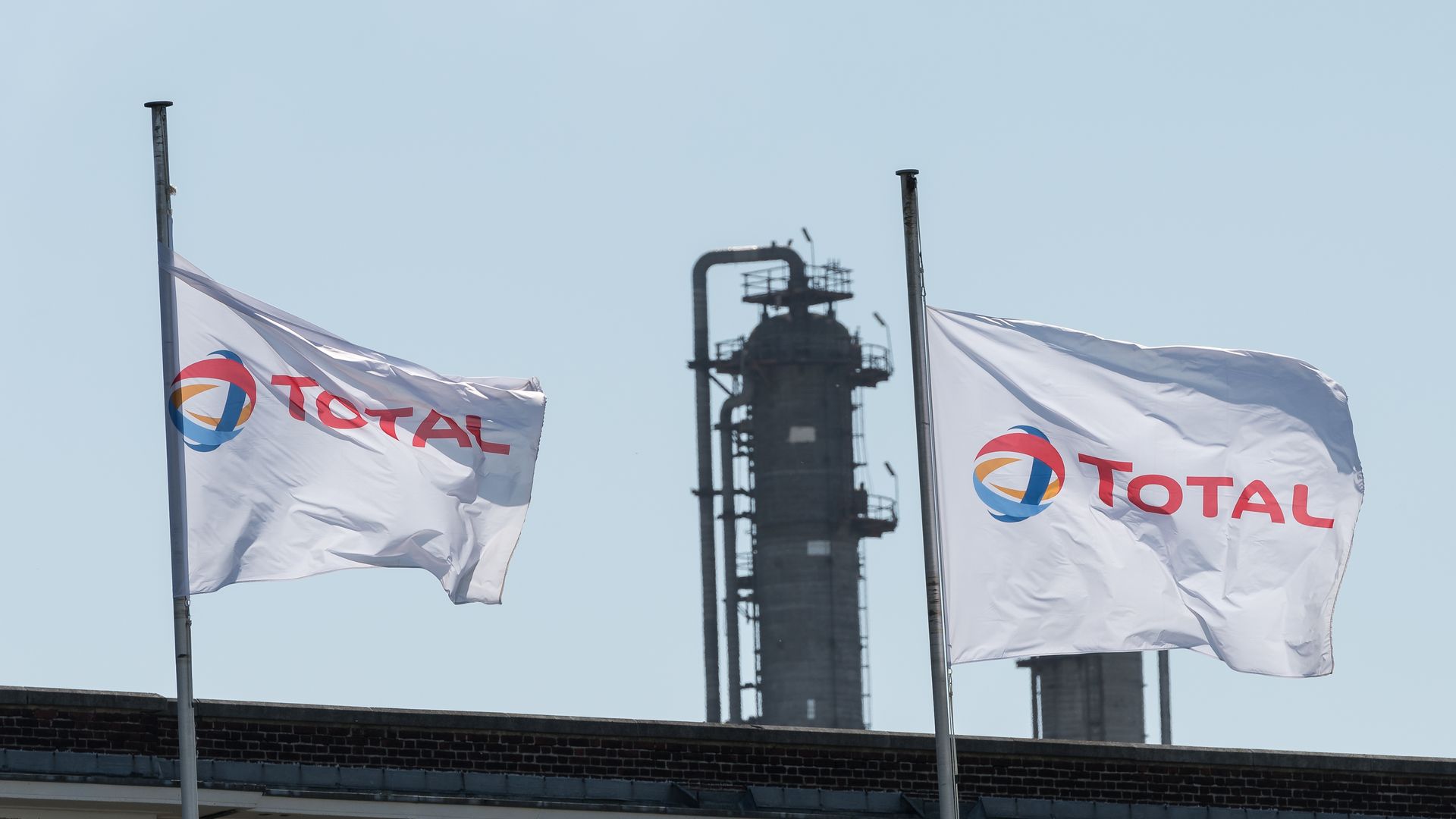 total flags flying over a rig
