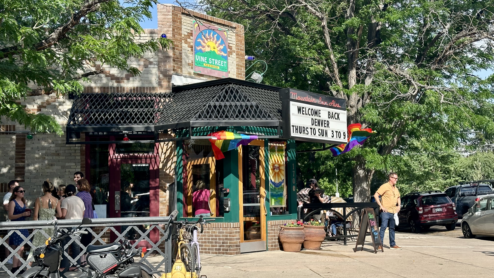 Vine Street's owner Kevin Daly, right, poses for a photo. Photo: John Frank/Axios
