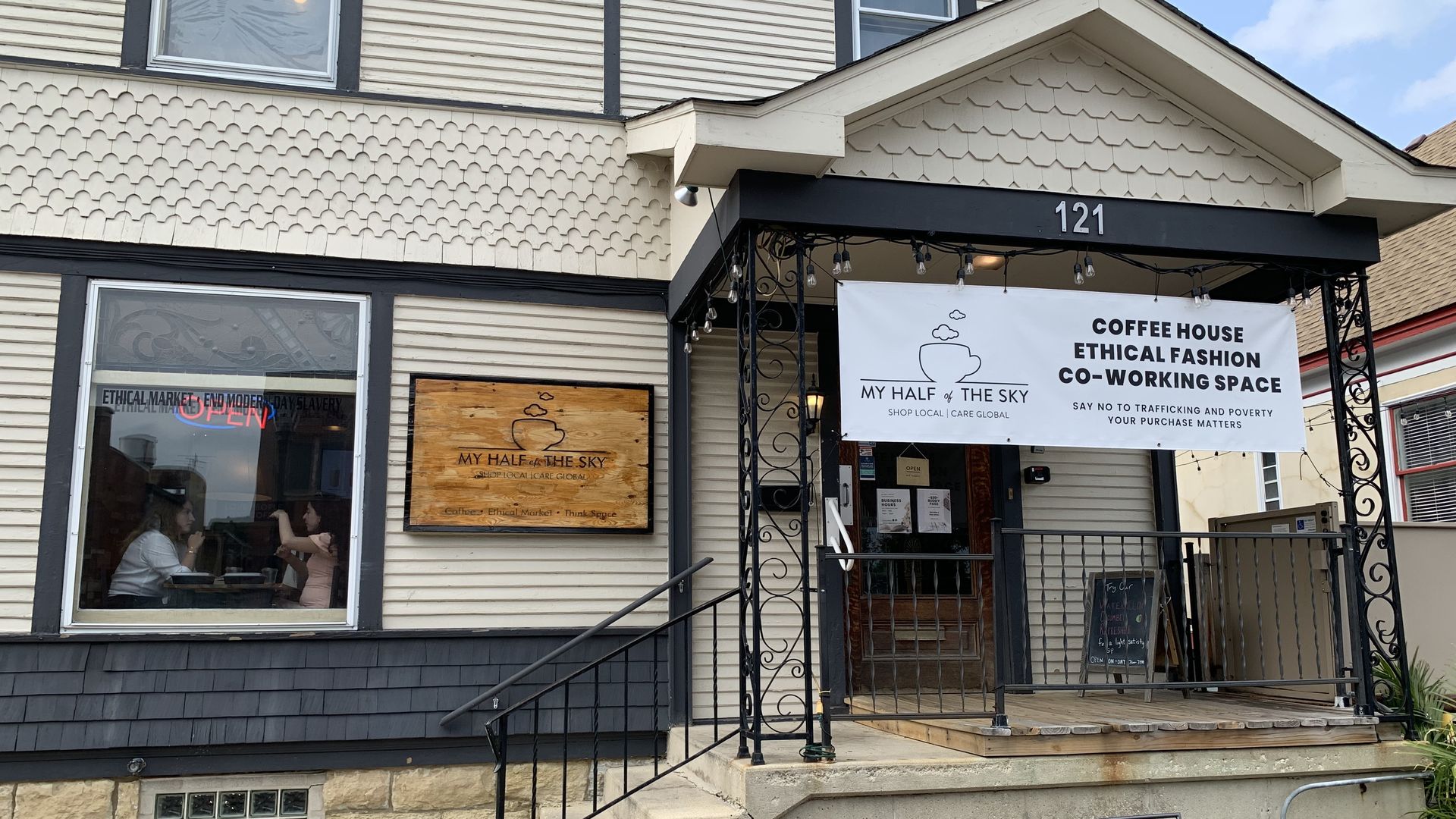 Photo of a front of a house that has been turned into a coffee shop
