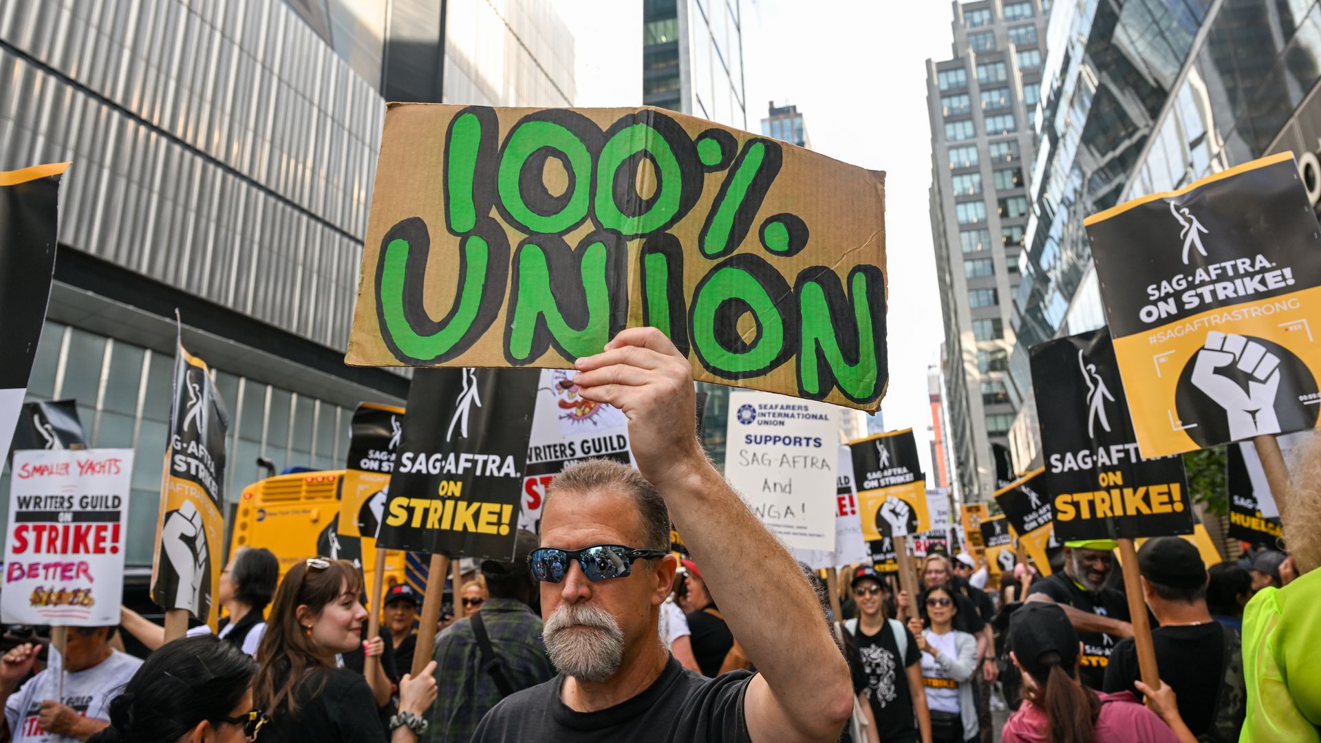 Members of the AFL-CIO, representing multiple unions, join members and supporters of the WGA and SAG-AFTRA on the picket line outside HBO and Amazon during a National Day of Solidarity on August 22, 2023 in New York City. (Photo by Alexi Rosenfeld/Getty Images)