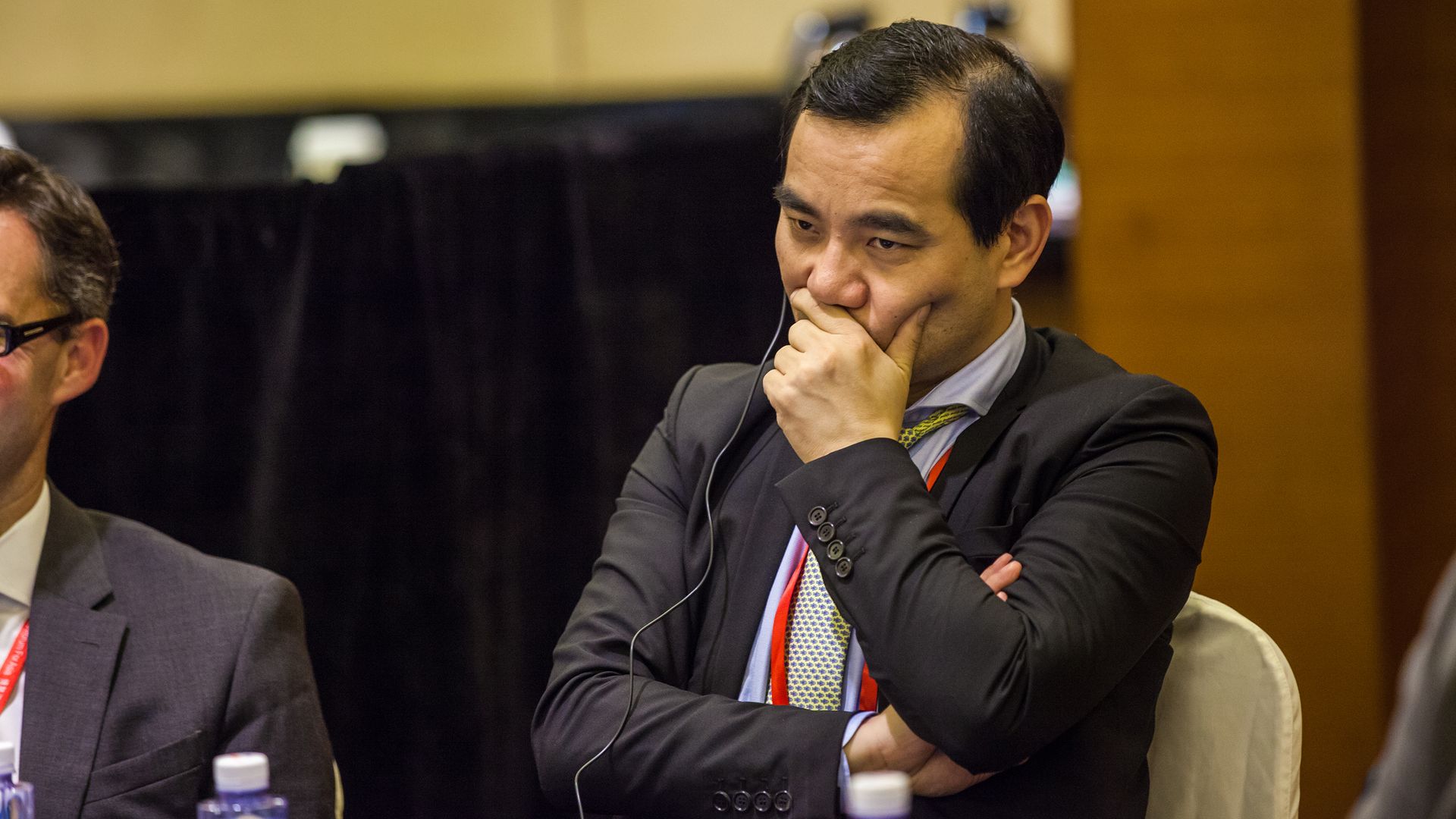 Wu Xiaohui sitting at table in 2017