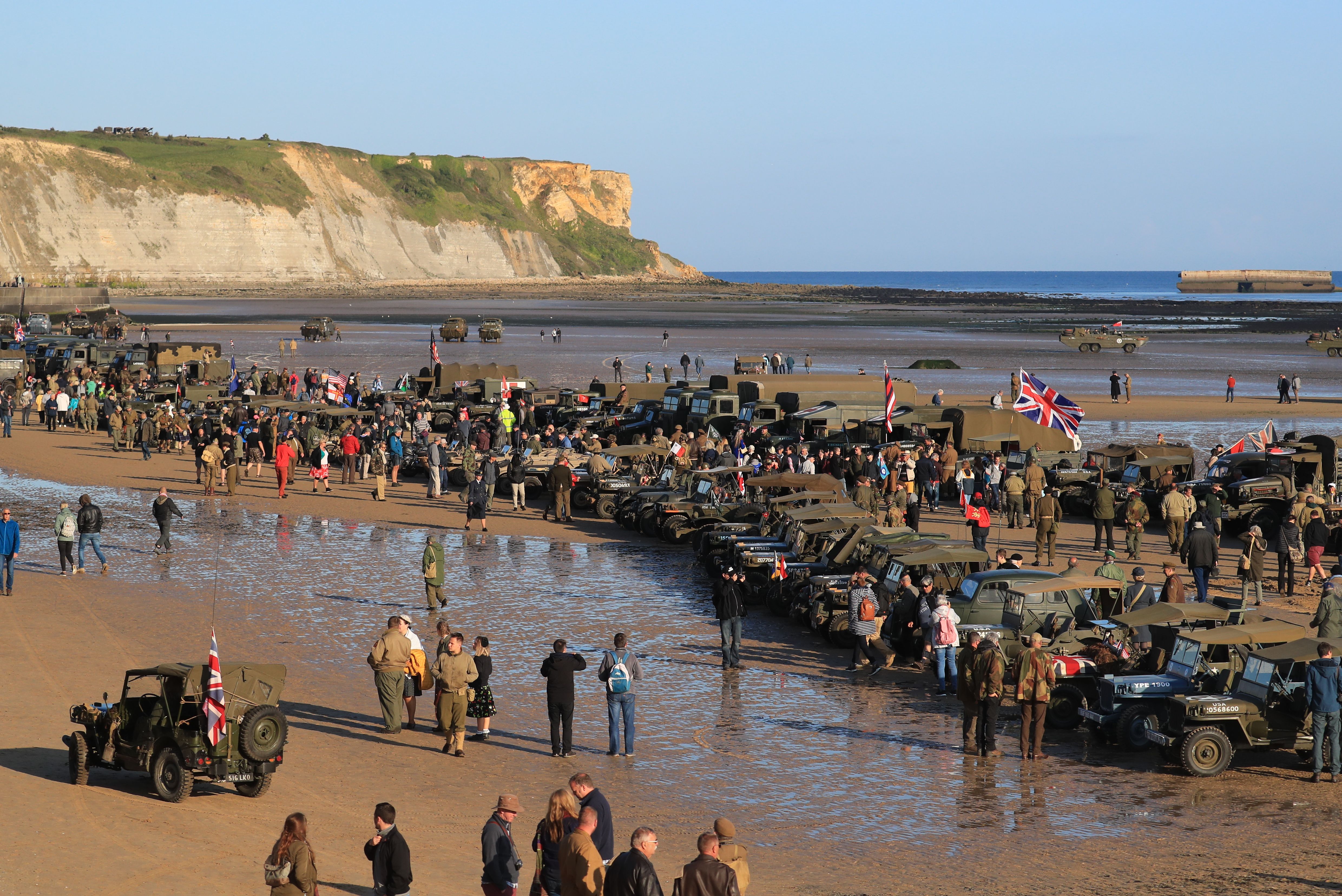 Military vehicles line the beach at Arromanches in Normandy, northern France, ahead of a day of events to mark the 75 anniversary of D-Day.