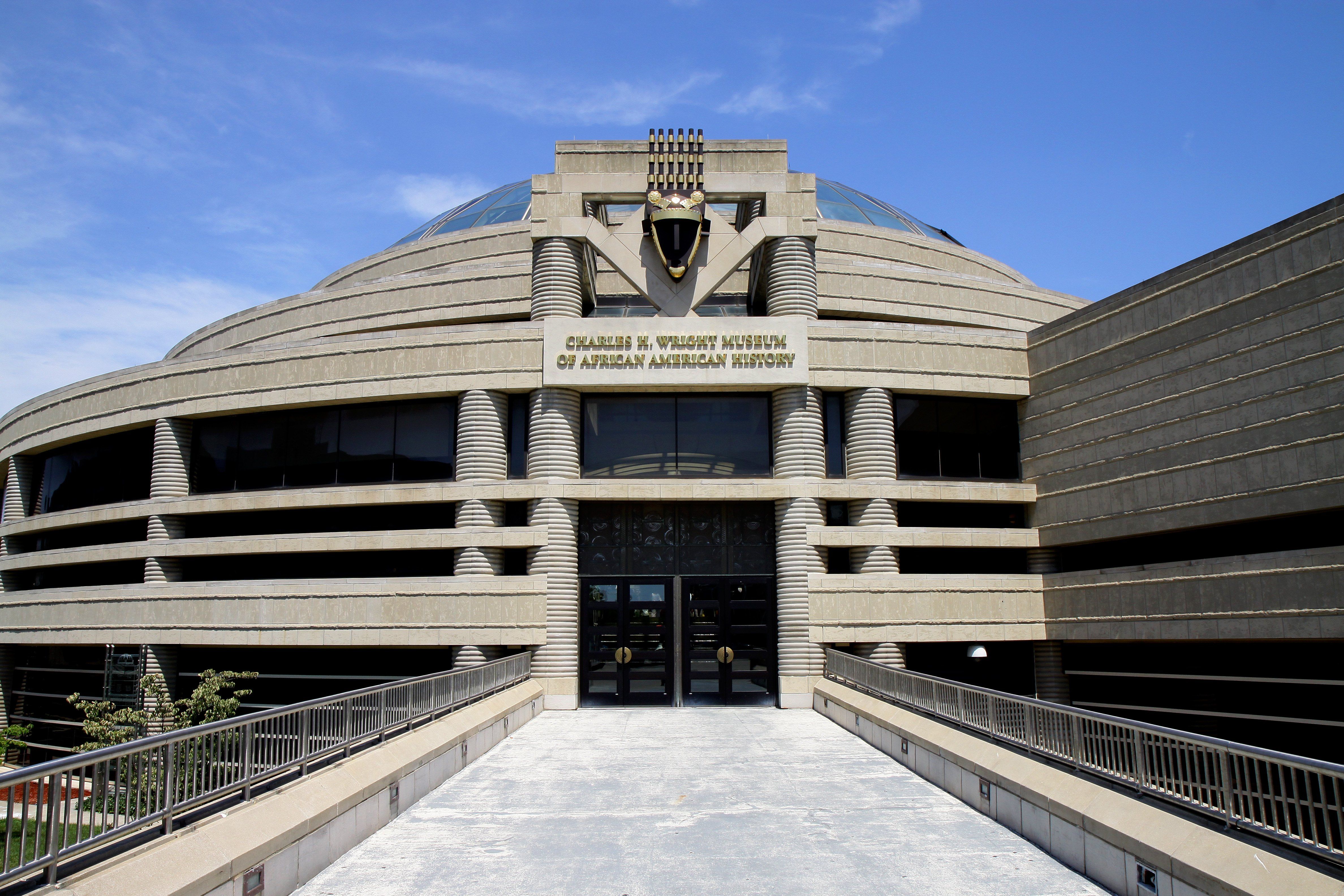 The exterior of the museum and its entrance are shown